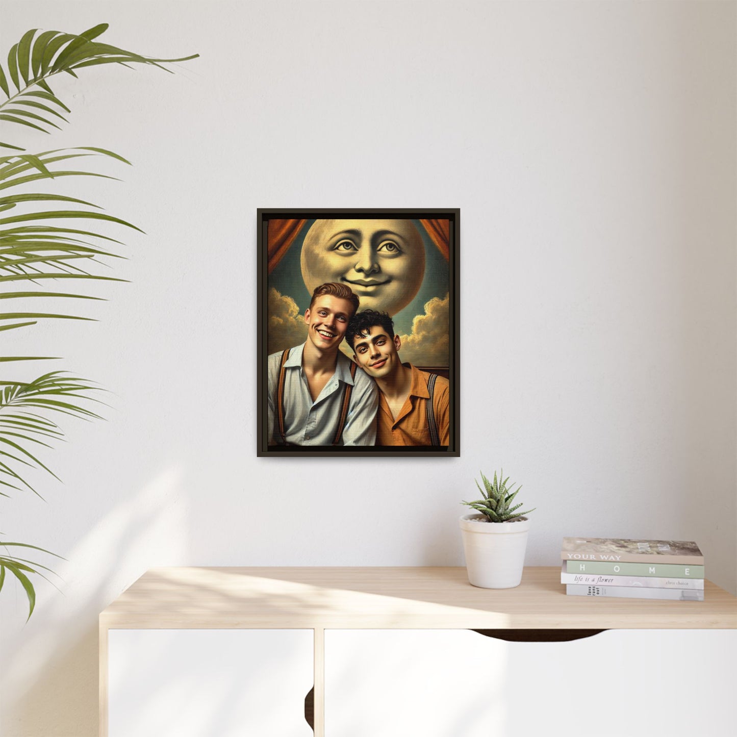 Framed artwork featuring a joyful queer couple in 1930s attire, seated close together beneath a smiling full moon in a theatrical studio setting. A celebration of reclaimed LGBTQ+ narratives in nostalgic portraiture.