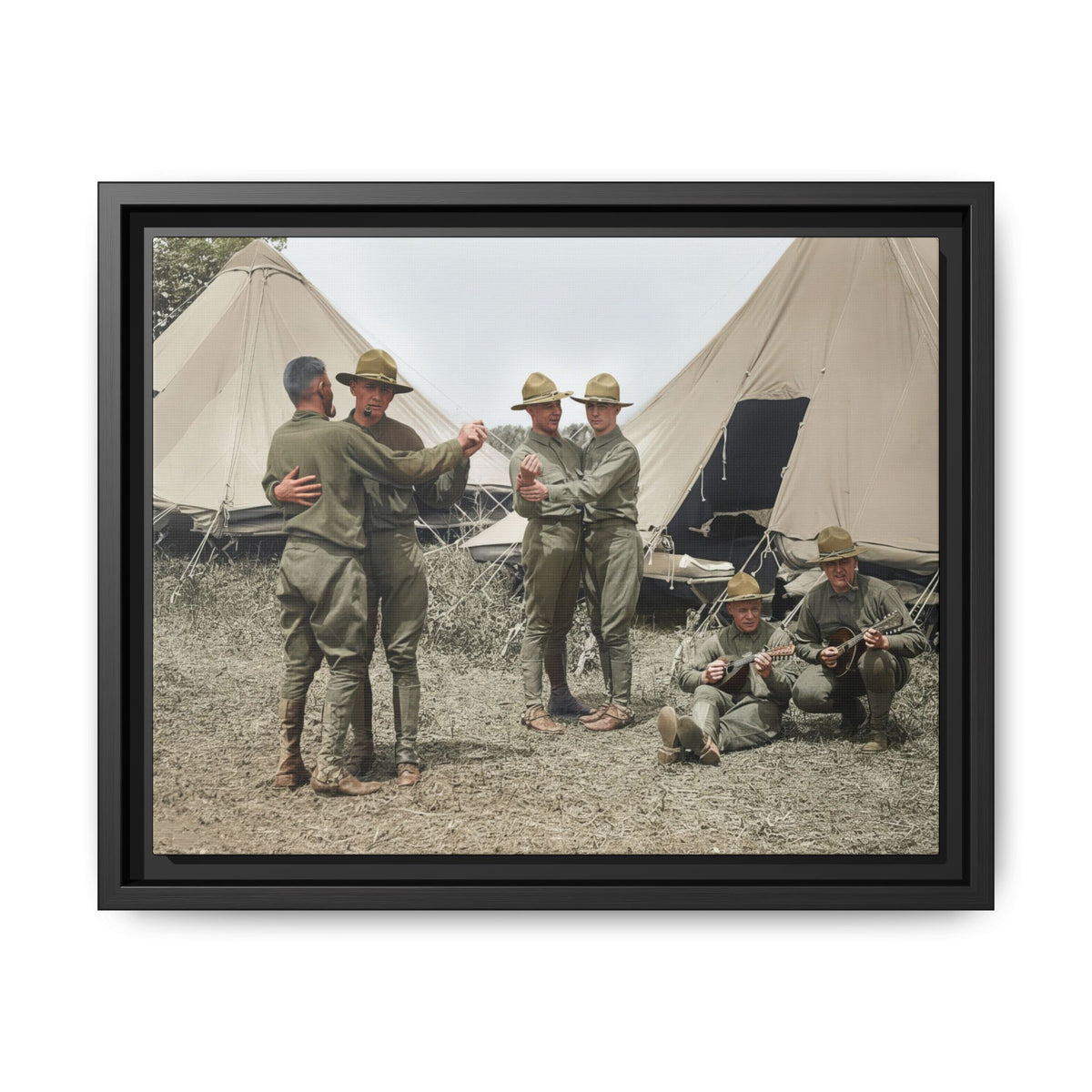 Restored colorized photograph of six uniformed men outside canvas tents, with two dancing pairs and two seated string musicians.
