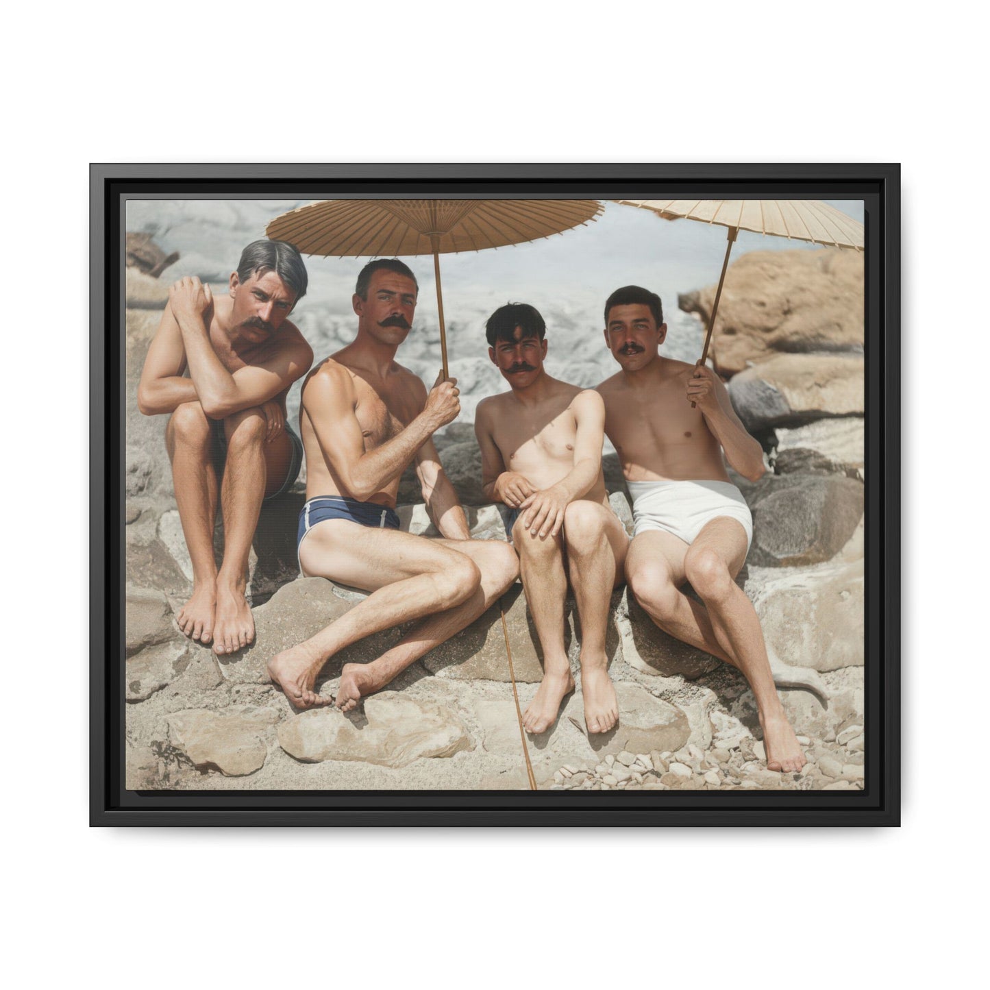 Historical beach photograph reproduced as matte canvas with four seated bathers and parasols 