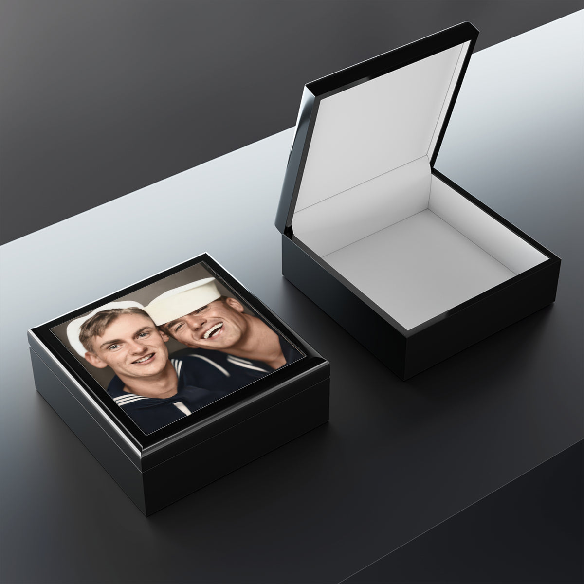 Open rubberwood keepsake box showing soft felt lining and a ceramic lid tile with a vintage photobooth photograph of two sailors.