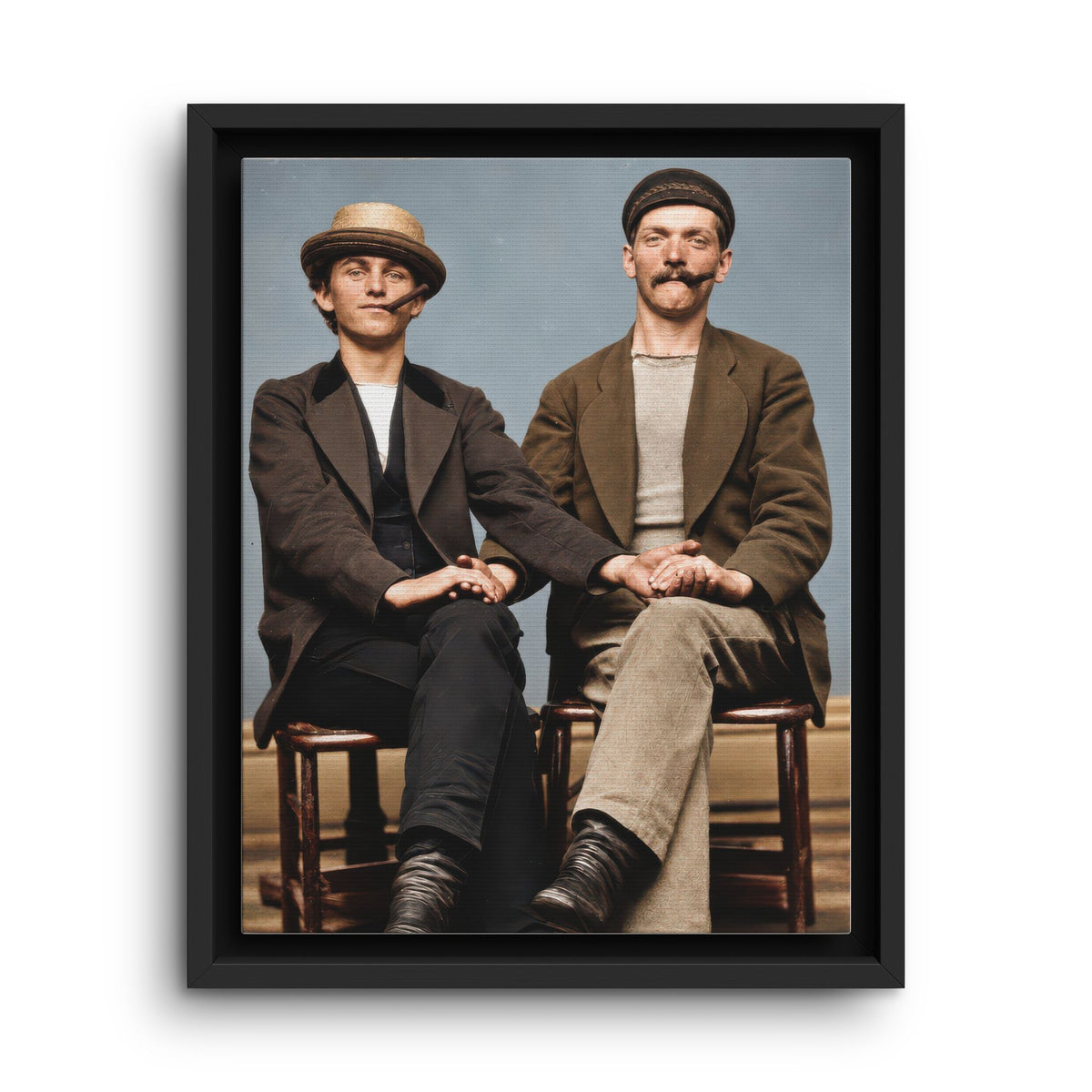 Colorized vintage studio portrait of two seated men wearing hats and smoking pipes, Paire 170 framed canvas wall art.