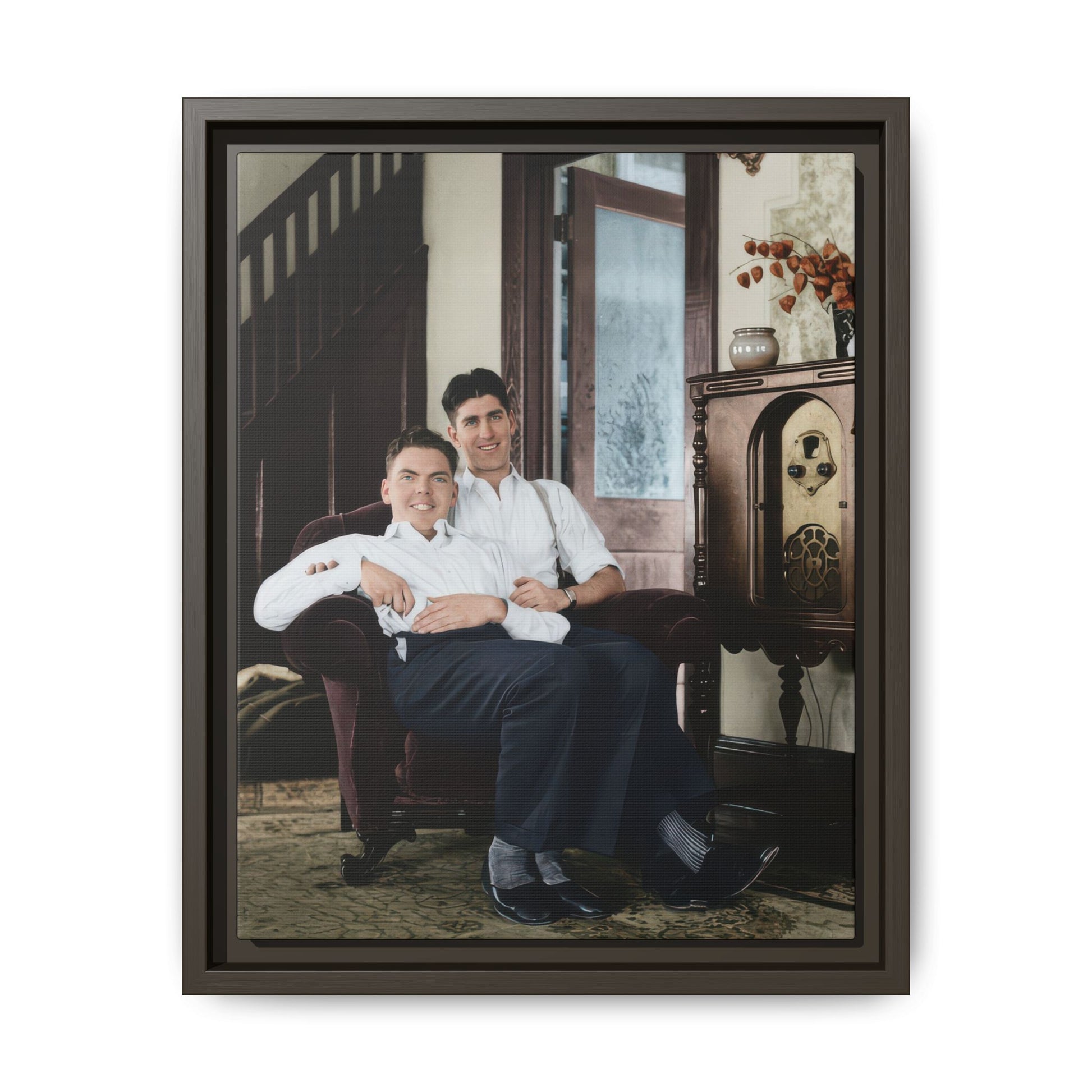 Historic indoor portrait with two men seated in armchair vintage archival photo