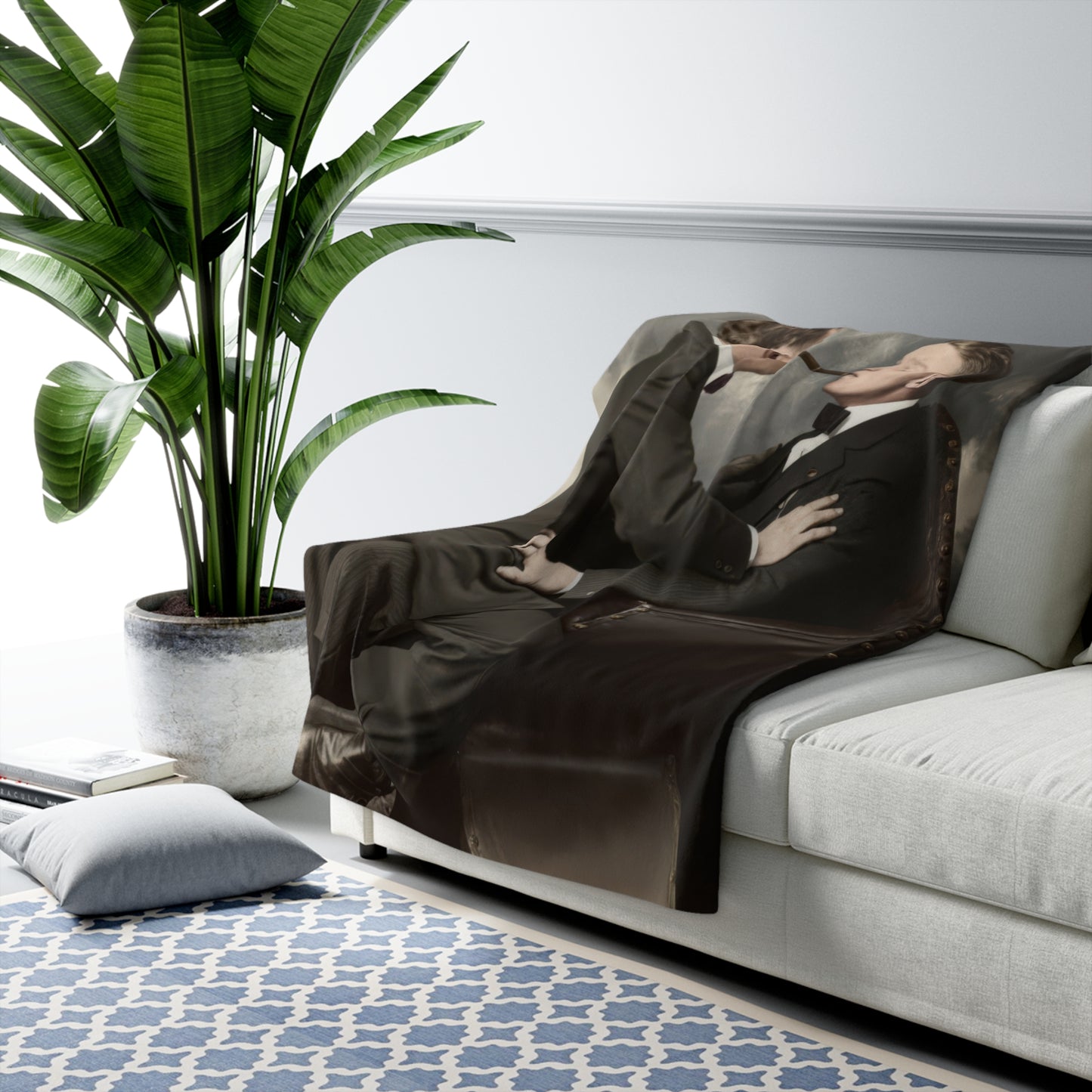 Historical sherpa blanket with formal menswear, leather chair, and intimate studio composition 