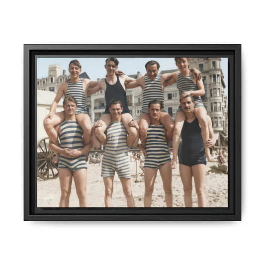 Group beach portrait with men in striped vintage swimwear and bathing huts 