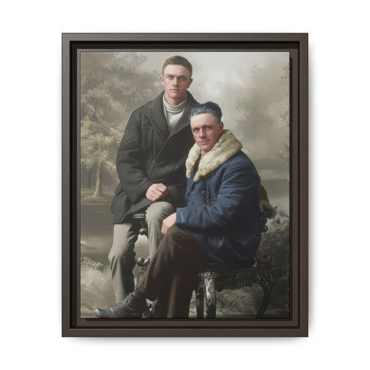 Historical seated portrait showing two closely posed men in winter outerwear against a scenic background