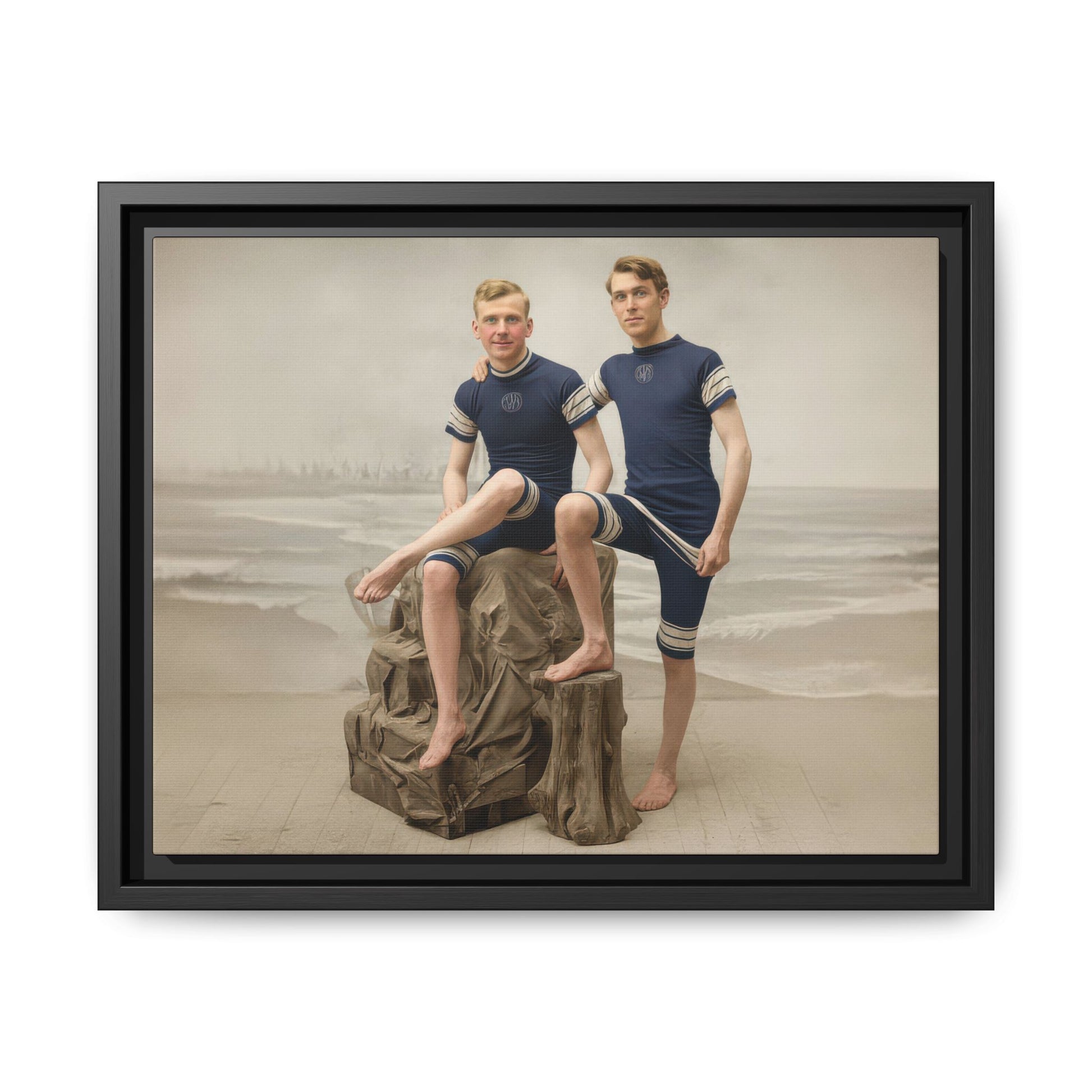 Restored vintage portrait of two men in matching swim costumes with seaside backdrop 