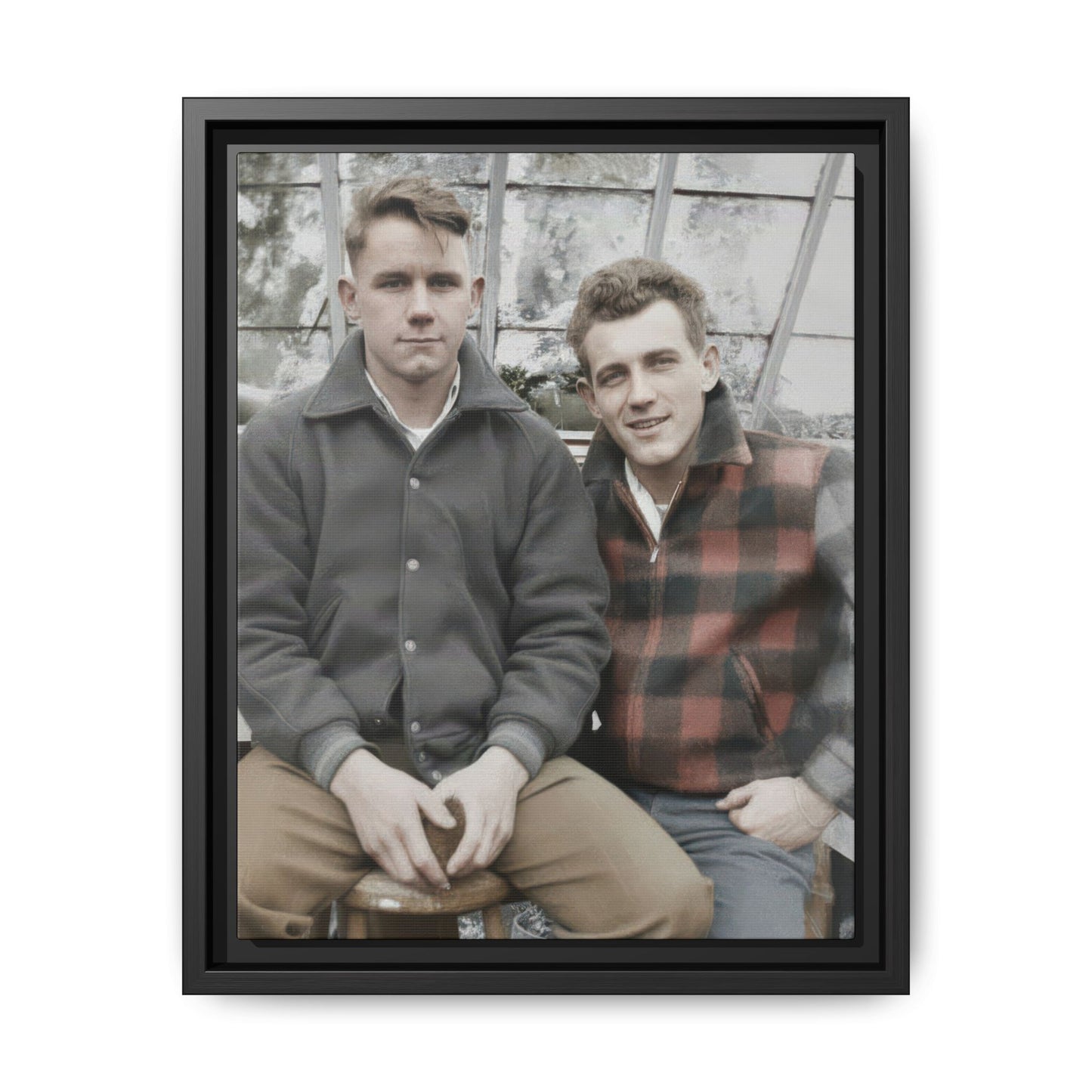 Vintage seated portrait of two men in jackets beside a rustic glass backdrop framed canvas