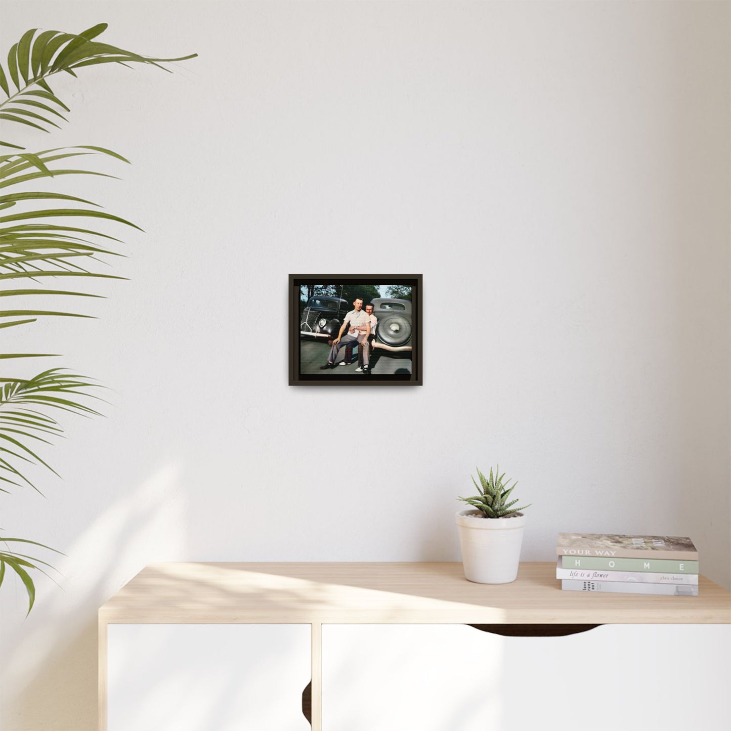 Restored 1930s vintage photo of Andrew and Eugene seated on a classic car bumper in Lincoln, Nebraska. Framed matte canvas art celebrating LGBTQ+ history, love, and timeless companionship.