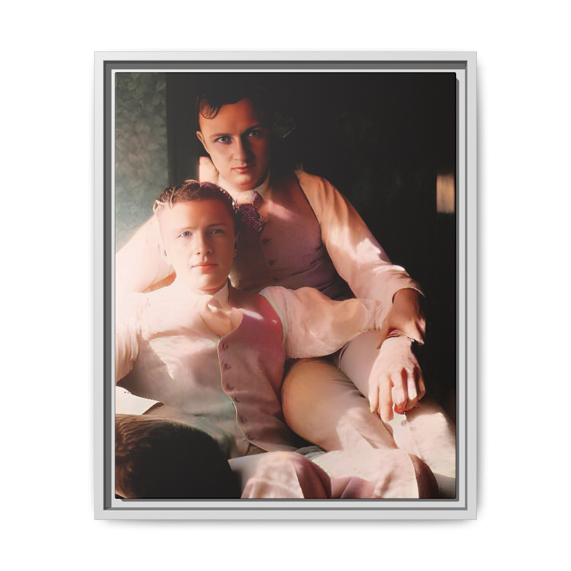 Restored vintage photograph of James and Henry, an early 1900s LGBTQ+ couple from Dayton, Ohio, sharing an intimate, sunlit moment. Framed matte canvas print celebrating love, devotion, and LGBTQ+ history.