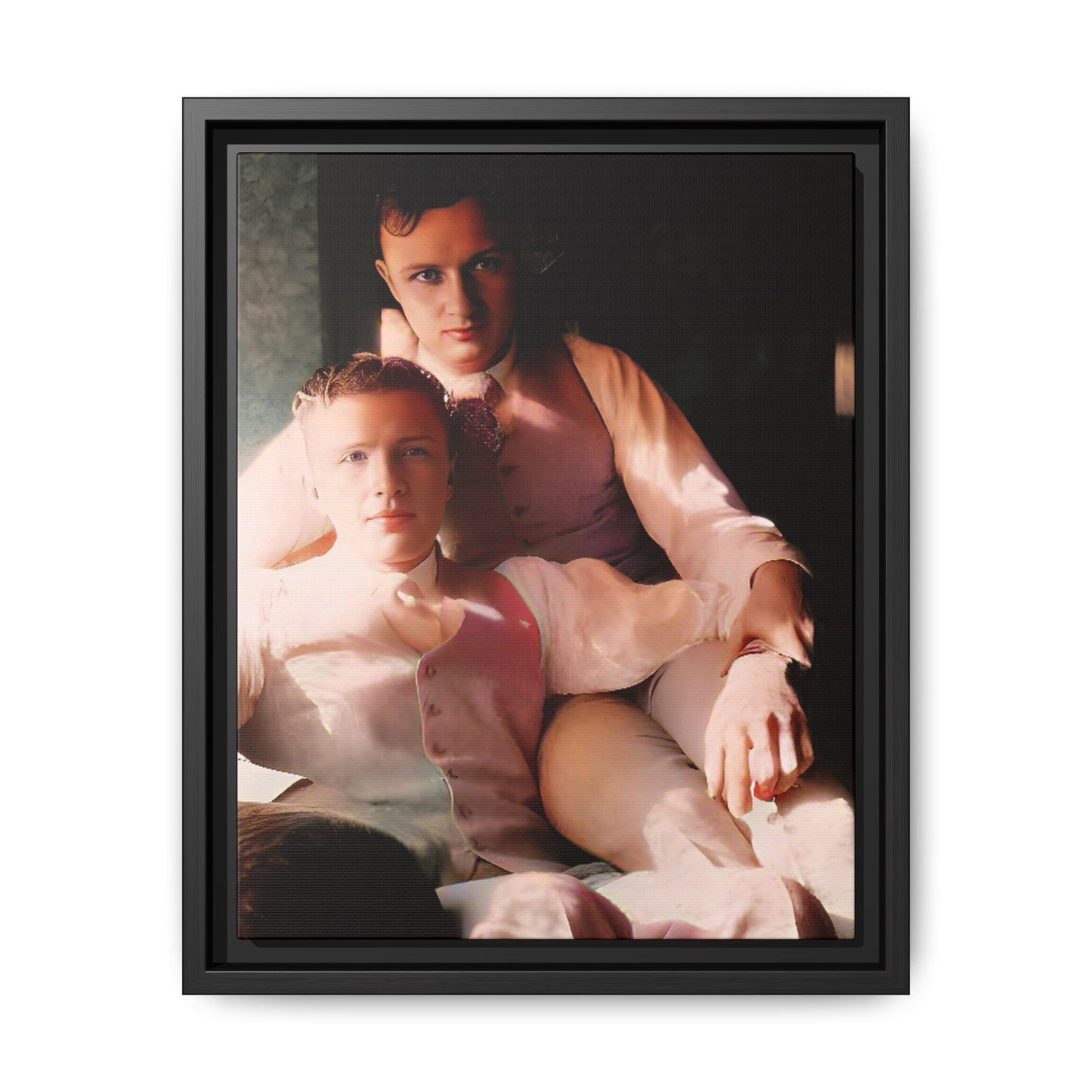 Restored vintage photograph of James and Henry, an early 1900s LGBTQ+ couple from Dayton, Ohio, sharing an intimate, sunlit moment. Framed matte canvas print celebrating love, devotion, and LGBTQ+ history.