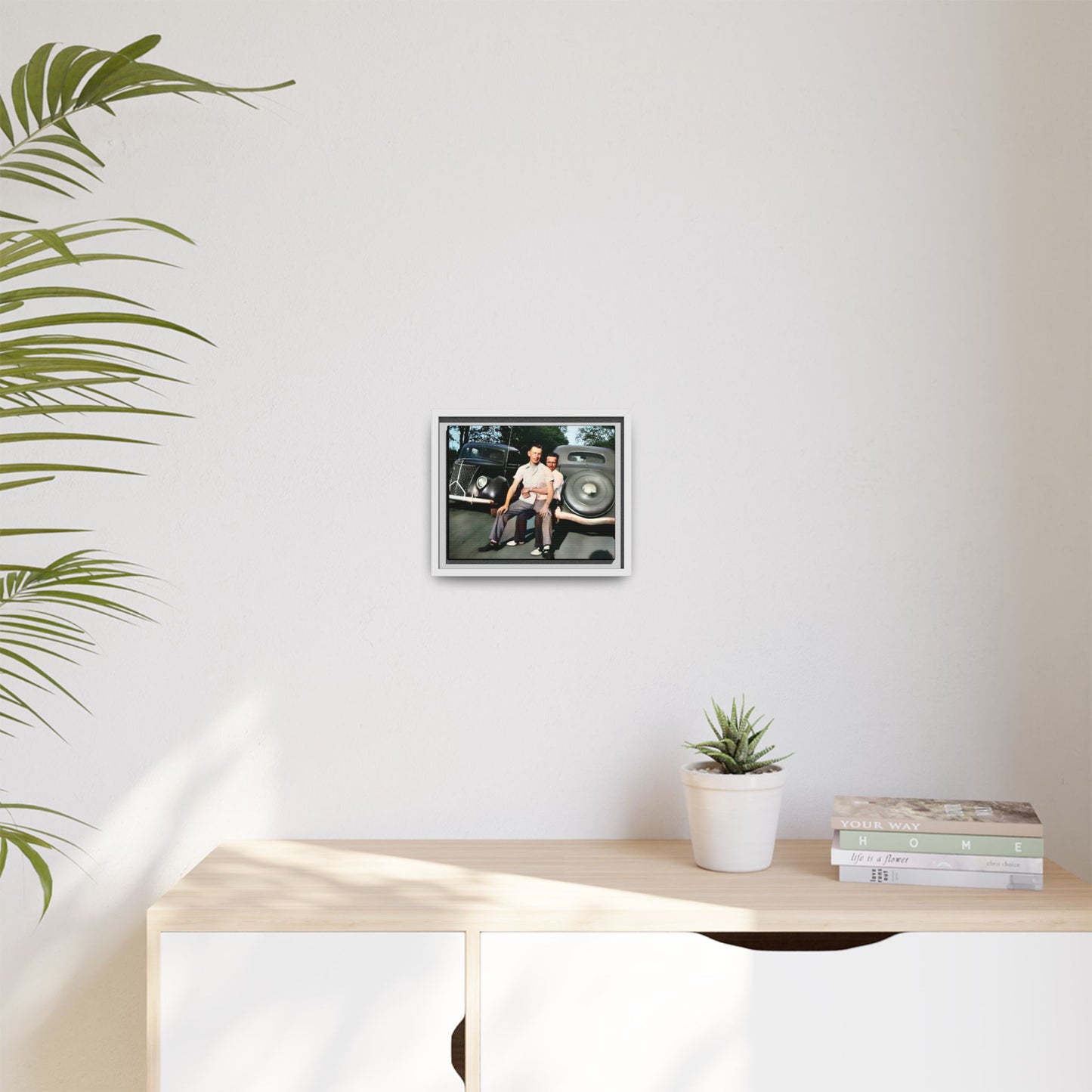 Restored 1930s vintage photo of Andrew and Eugene seated on a classic car bumper in Lincoln, Nebraska. Framed matte canvas art celebrating LGBTQ+ history, love, and timeless companionship.