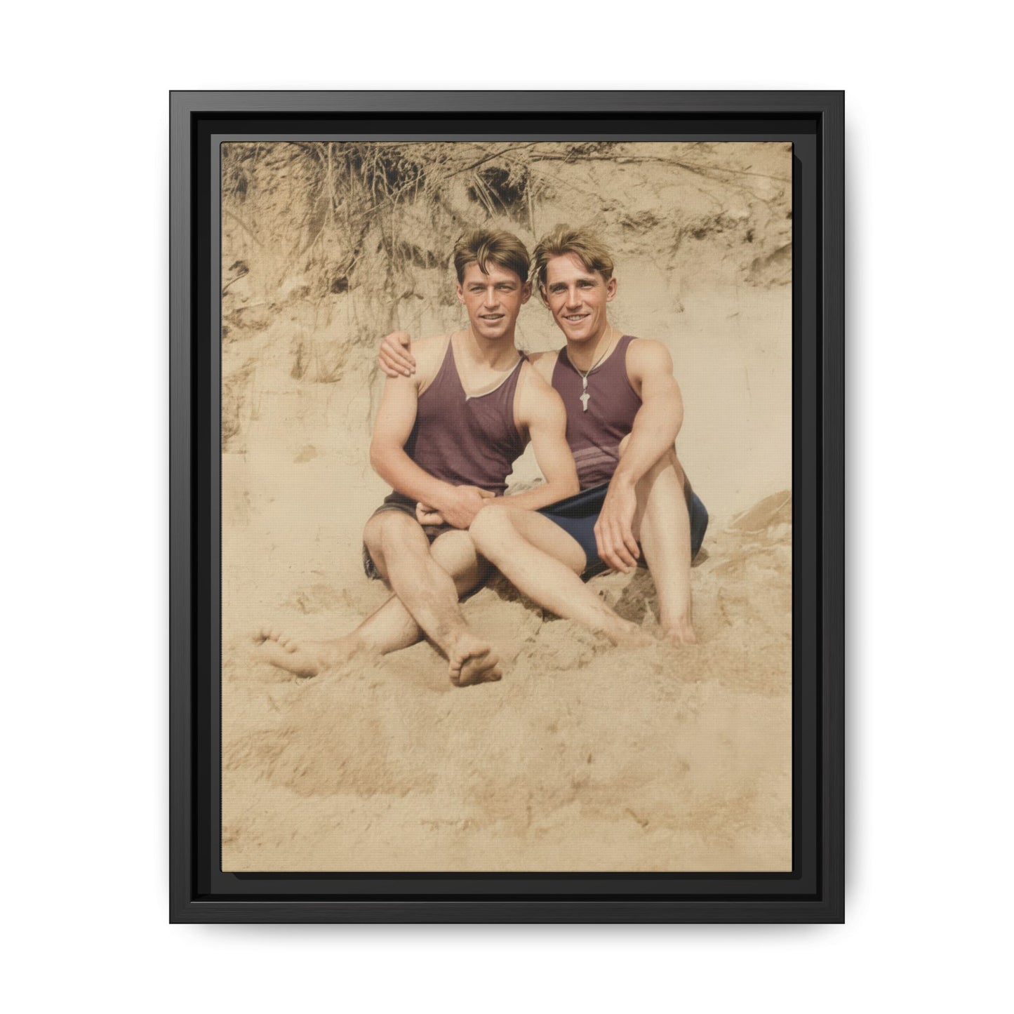 Two men seated in sand vintage photograph restored and colorized 