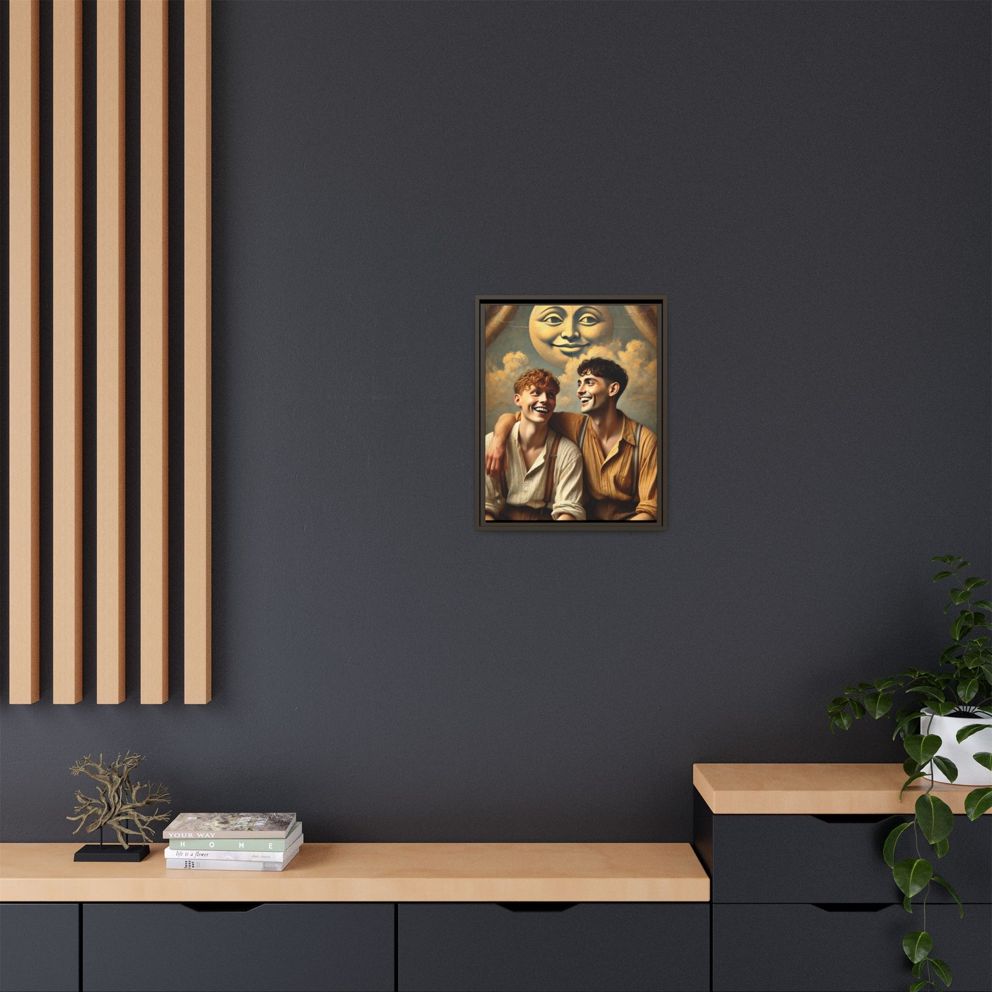 Queer artwork of two joyful young men dressed in vintage clothing with rolled sleeves and suspenders, laughing under a large moon prop in a dreamy studio scene. A celebration of love and resilience reclaimed from forgotten queer histories.