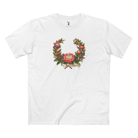 Light-colored King Protea Pride T-shirt featuring a colorful botanical wreath, a central crown-like protea flower, and dark UKUZIQHENYA lettering.