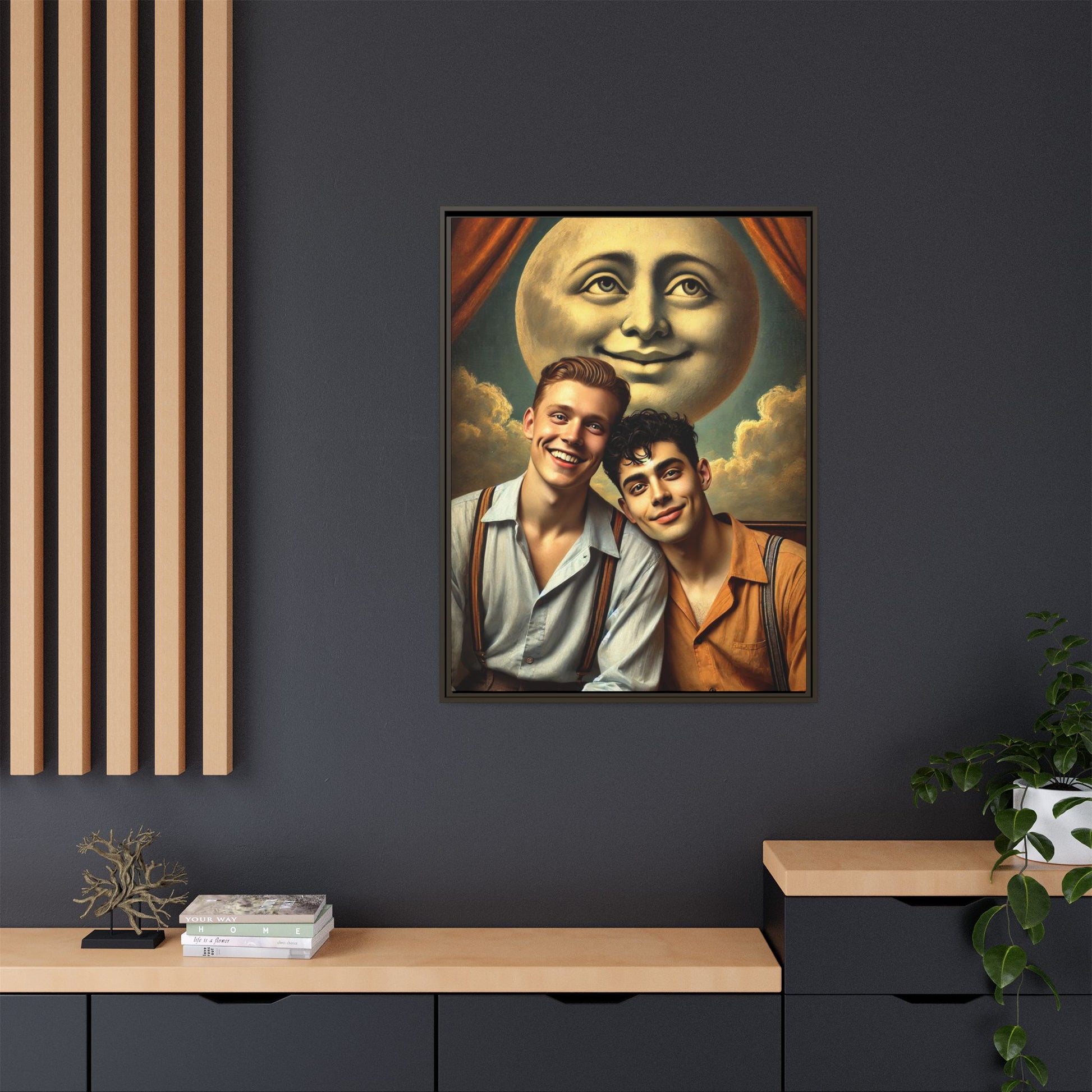 Framed artwork featuring a joyful queer couple in 1930s attire, seated close together beneath a smiling full moon in a theatrical studio setting. A celebration of reclaimed LGBTQ+ narratives in nostalgic portraiture.