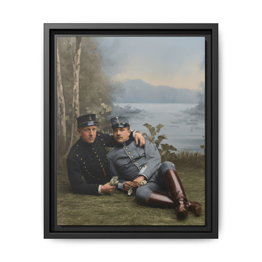 Vintage photograph of two companions in military-style uniforms reclining by a lakeside backdrop