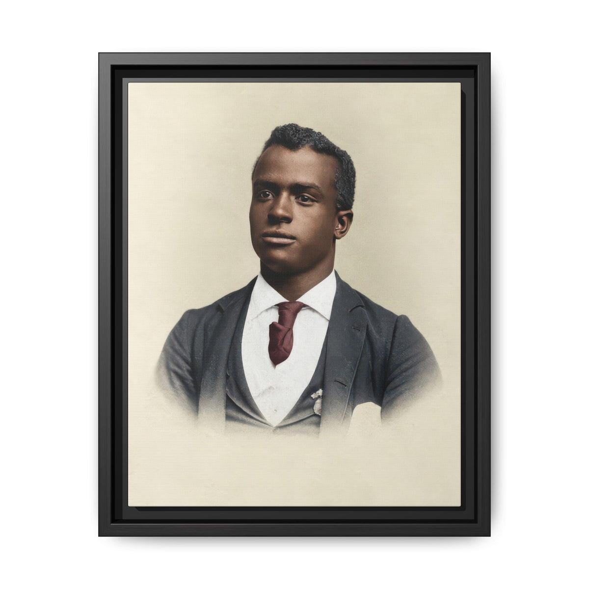 Restored, colorized portrait of a Black man in a dark jacket and waistcoat, light shirt, and muted red-brown tie against a pale background.