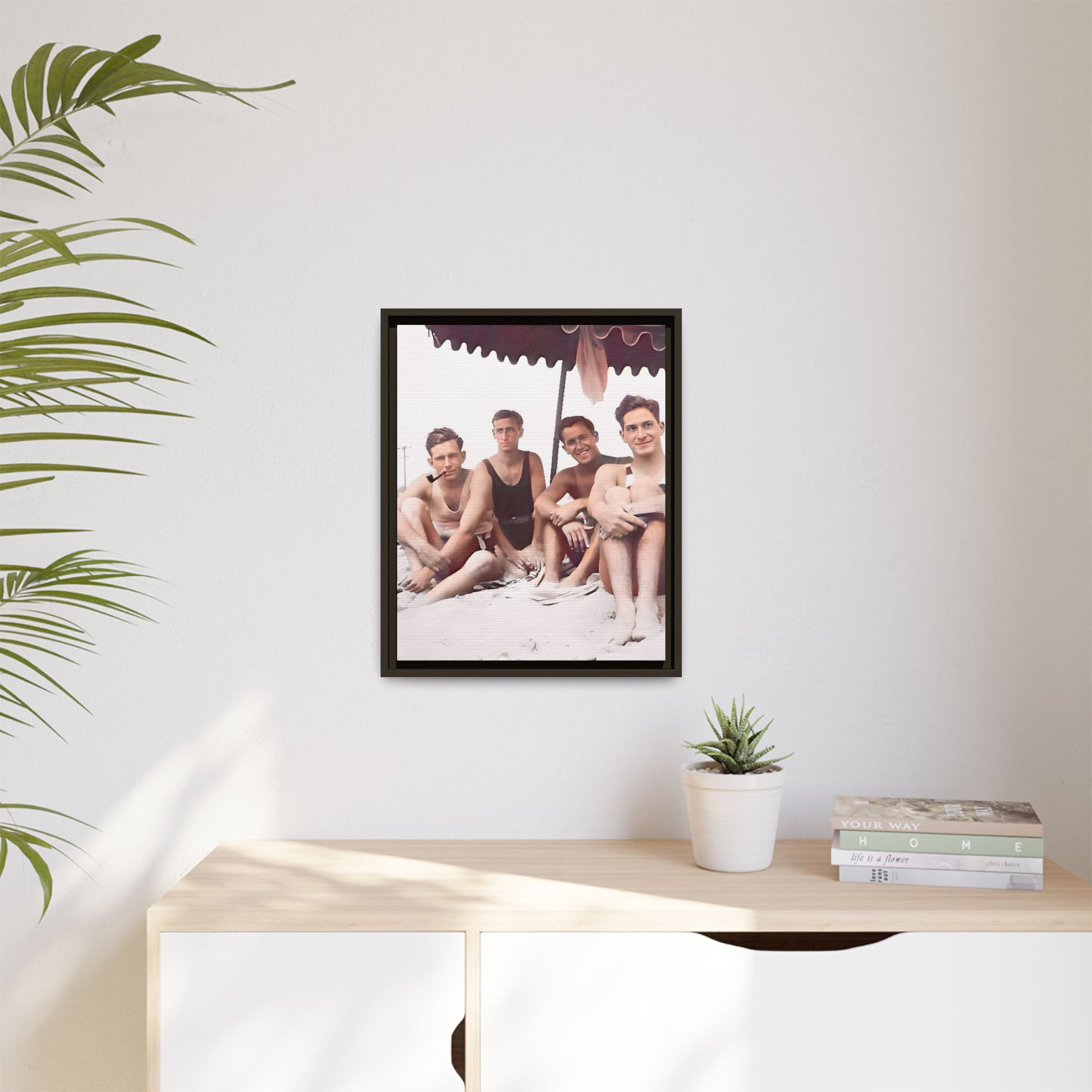 Restored vintage 1920s photograph of men enjoying a sunny beach day in Asbury Park, New Jersey, under a striped canopy. Framed matte canvas print celebrating LGBTQ+ history, joy, and camaraderie