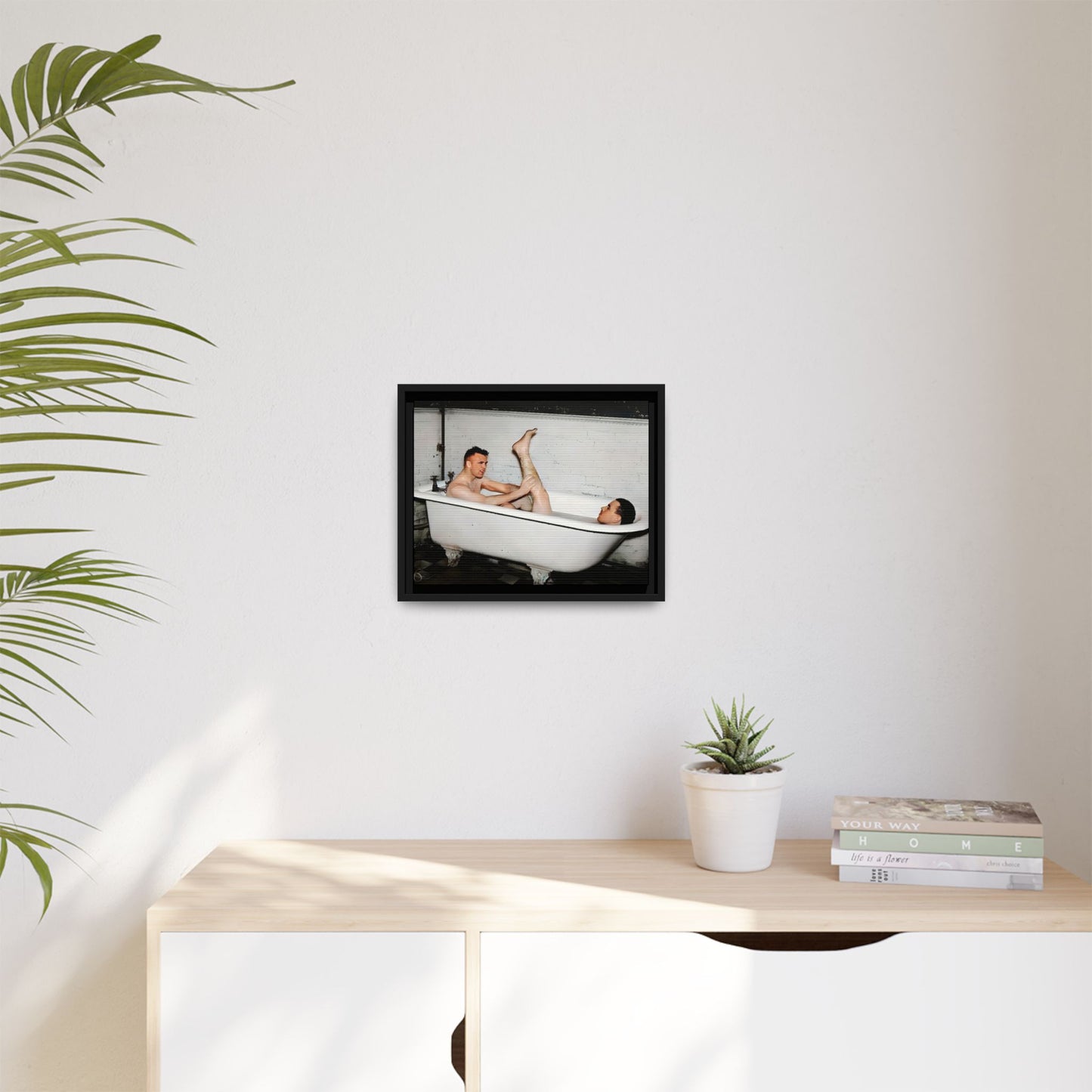 Restored vintage photo of Leon & Michael, a playful gay couple in a clawfoot bathtub, early 20th century, framed canvas.