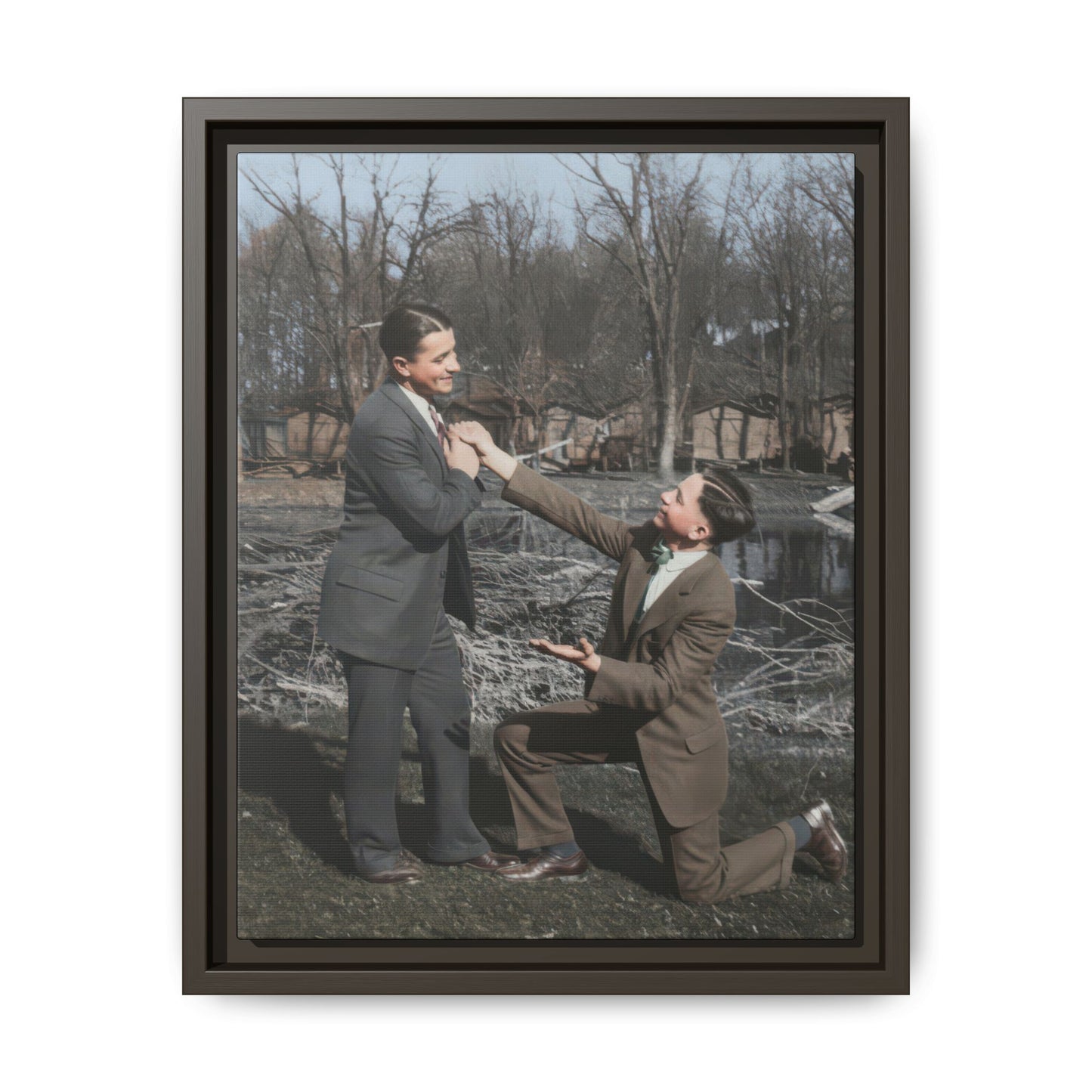 Early 20th century historical photograph with dramatic staged pose near water