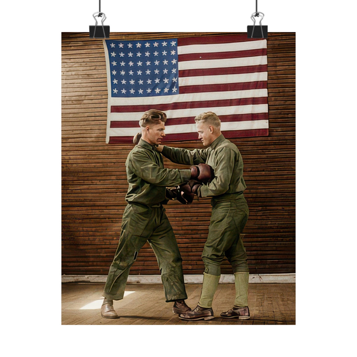 Olive-toned training garments, padded boxing gloves, and a large American flag stand out against horizontal wooden wallboards.