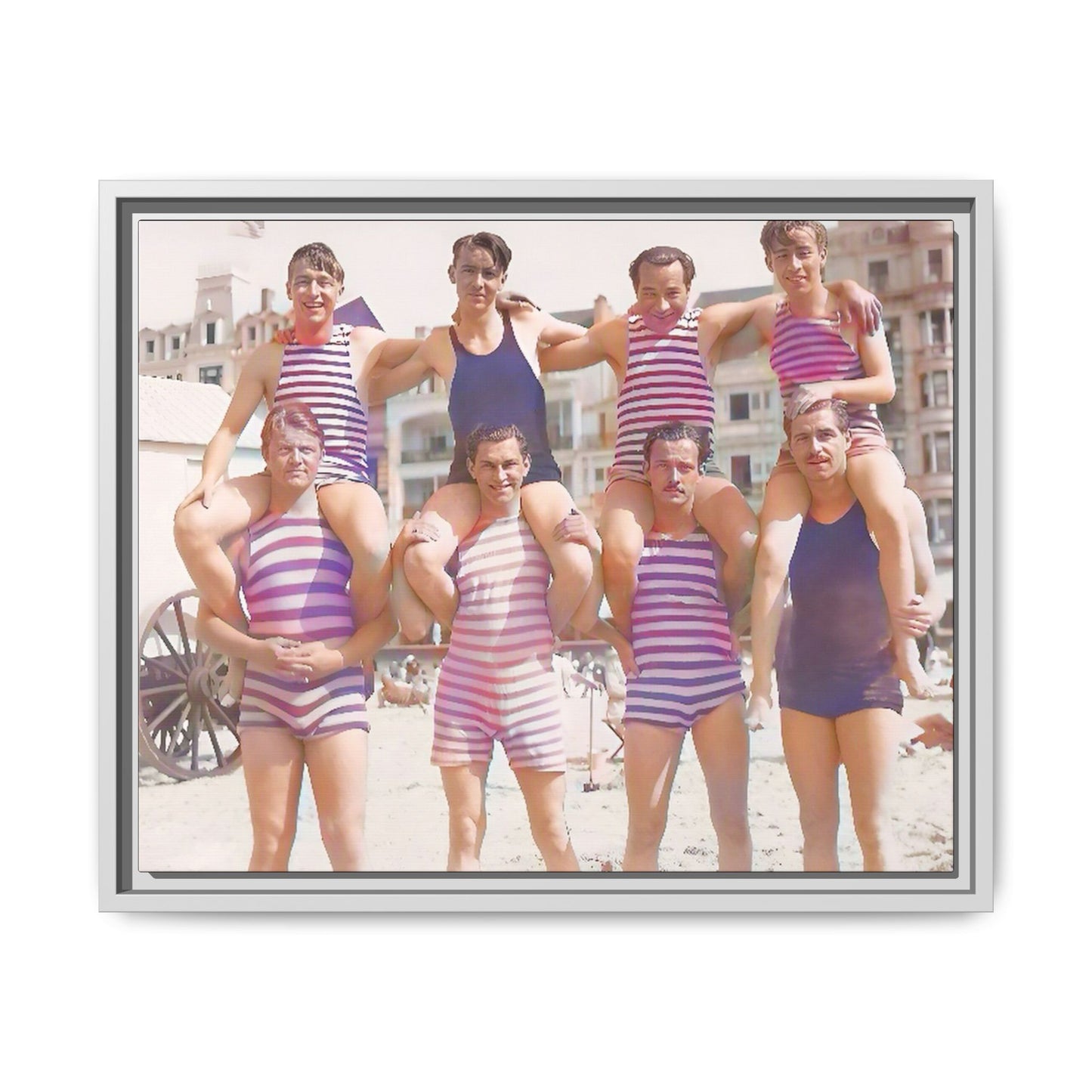 Restored vintage photo of a Bachelor Party in Corpus Christi TX, featuring men in striped swimwear forming human towers, framed canvas art.