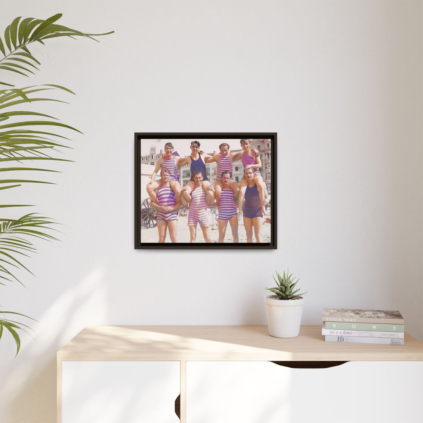 Restored vintage photo of a Bachelor Party in Corpus Christi TX, featuring men in striped swimwear forming human towers, framed canvas art.