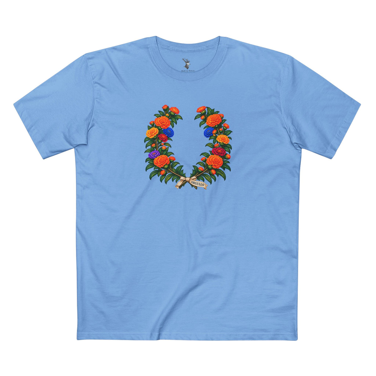 Mexican Cempasúchil Pride T-shirt featuring a laurel-style crown of golden-orange marigolds, muted Pride-colored flowers, and ORGULLO lettering below.