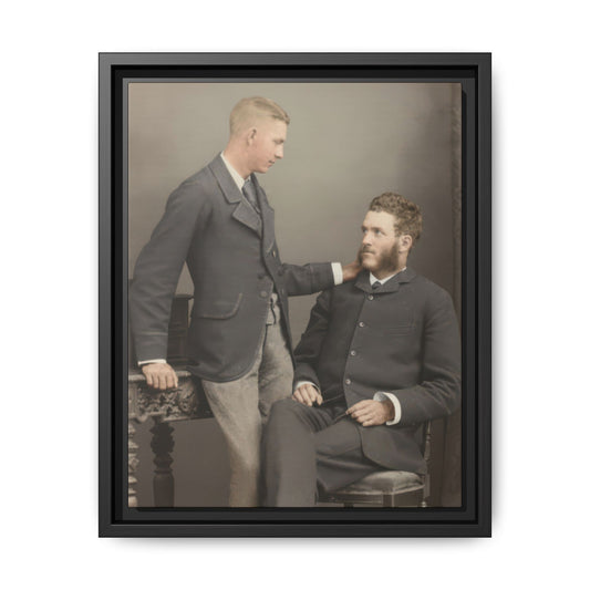 Vintage studio portrait of two men with hand on shoulder framed canvas wall art