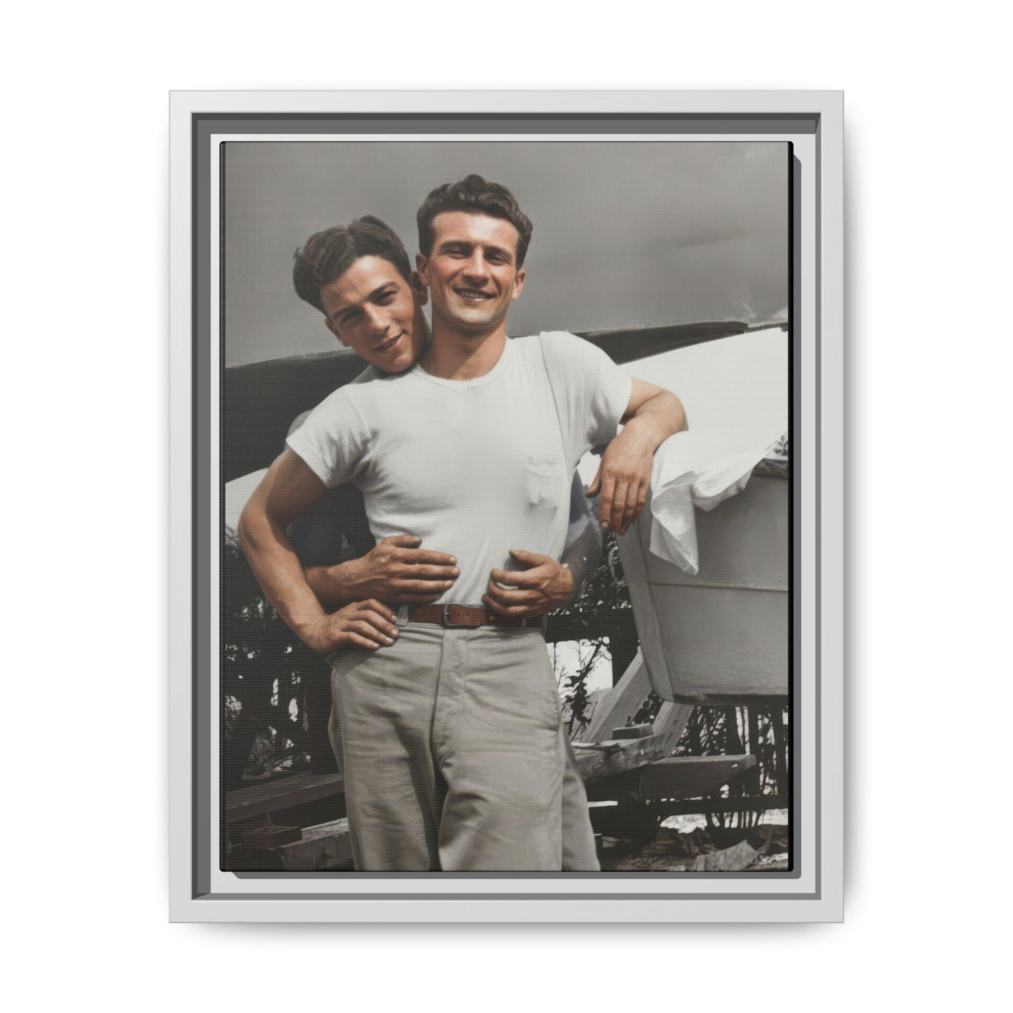 Framed vintage canvas featuring a boatyard scene with white shirts and strong tonal contrast
