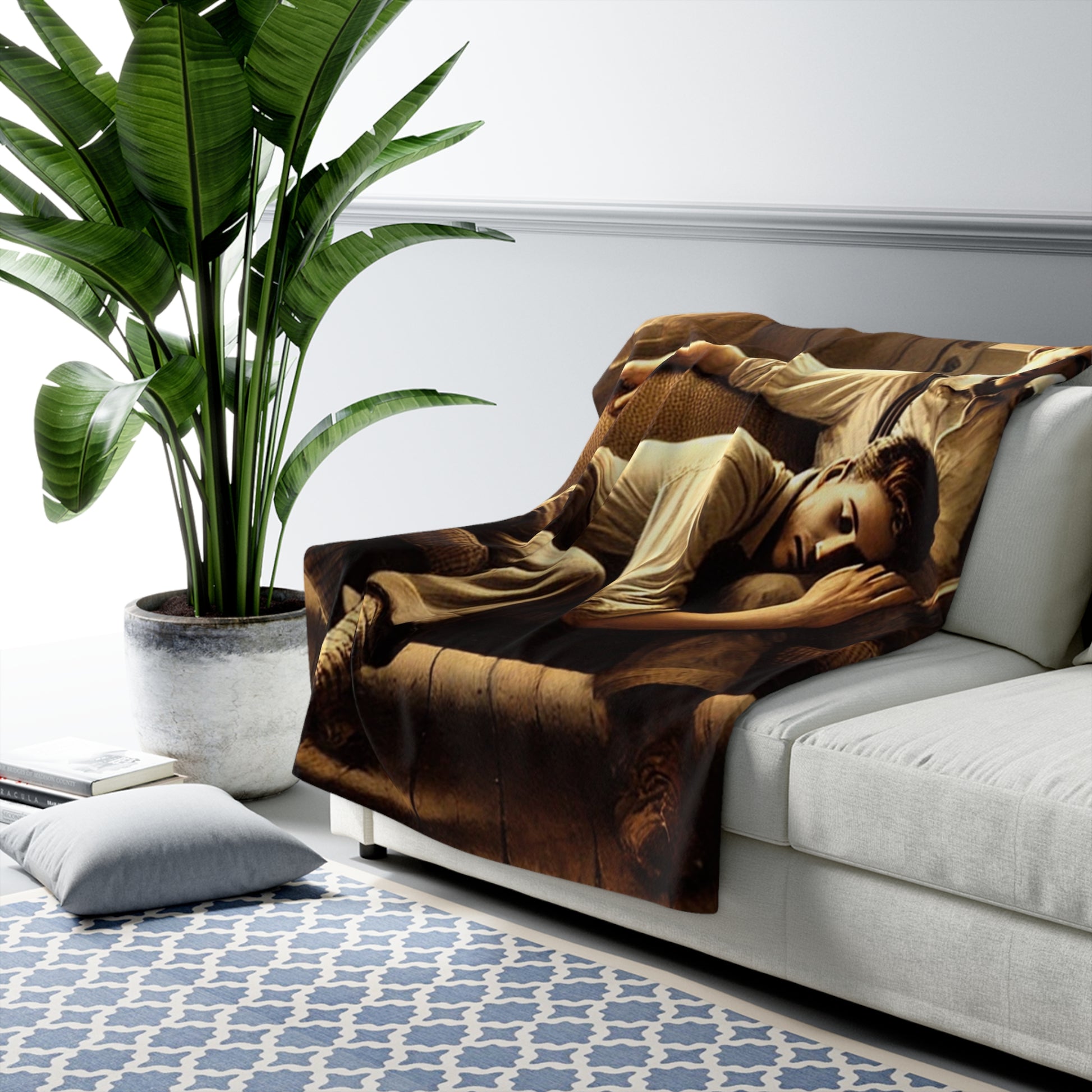 Art-inspired sherpa blanket showing two young men in a rustic American interior 