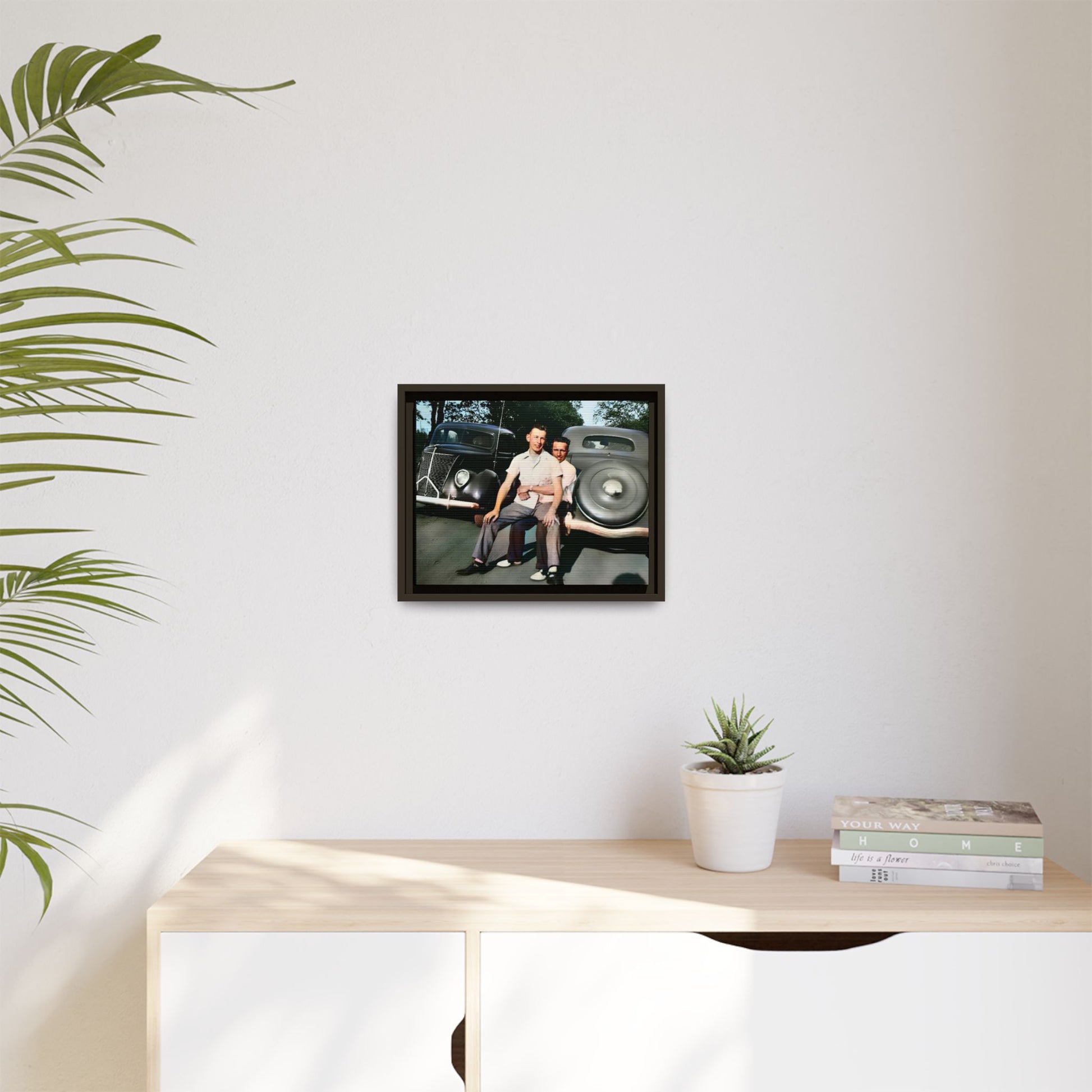 Restored 1930s vintage photo of Andrew and Eugene seated on a classic car bumper in Lincoln, Nebraska. Framed matte canvas art celebrating LGBTQ+ history, love, and timeless companionship.