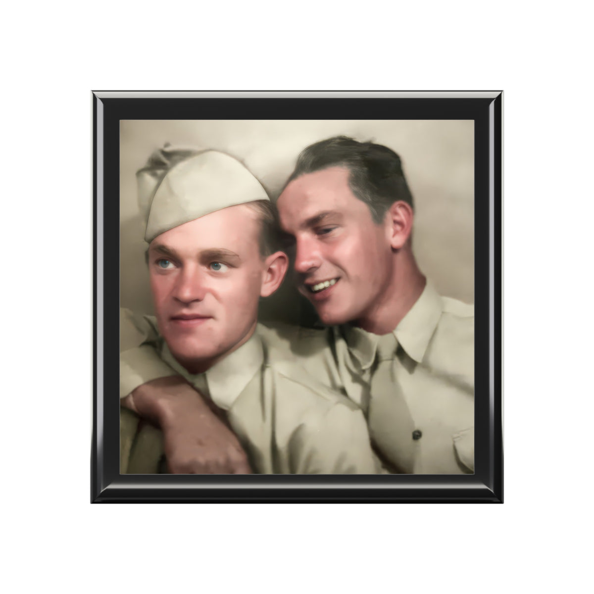 Closed wooden keepsake box viewed at an angle, with a vintage portrait of two men in light uniforms on the ceramic tile lid.