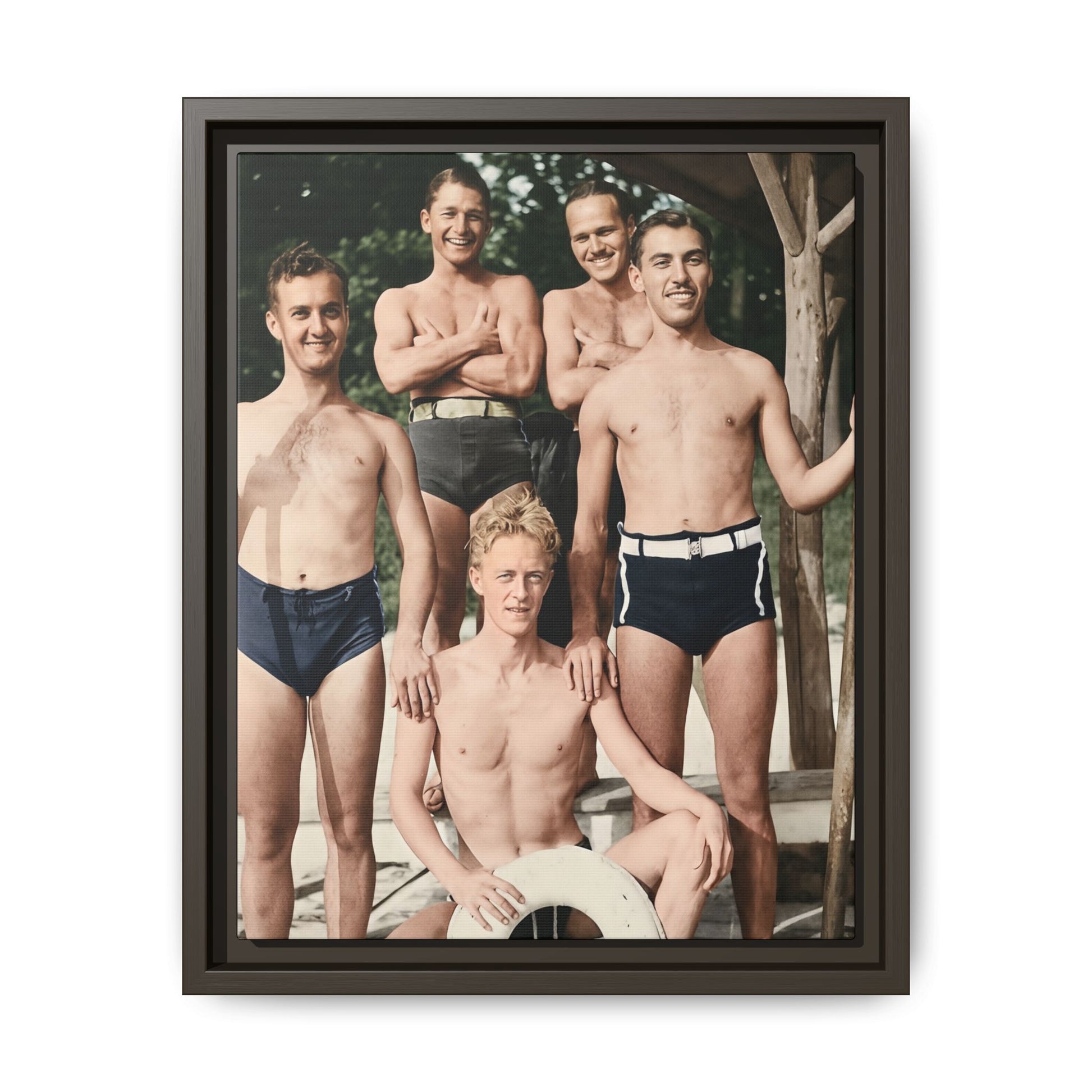Framed matte canvas wall art showing a 1930s to 1940s dockside group portrait in period swimwear 