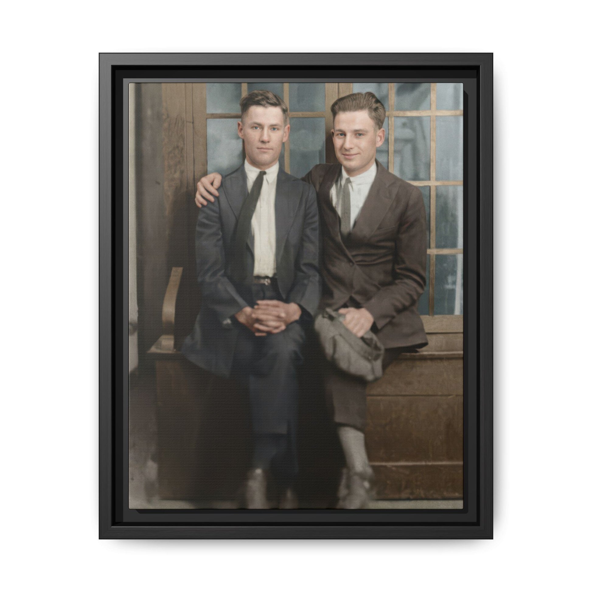 Vintage portrait of two men seated with arm over shoulder framed canvas wall art