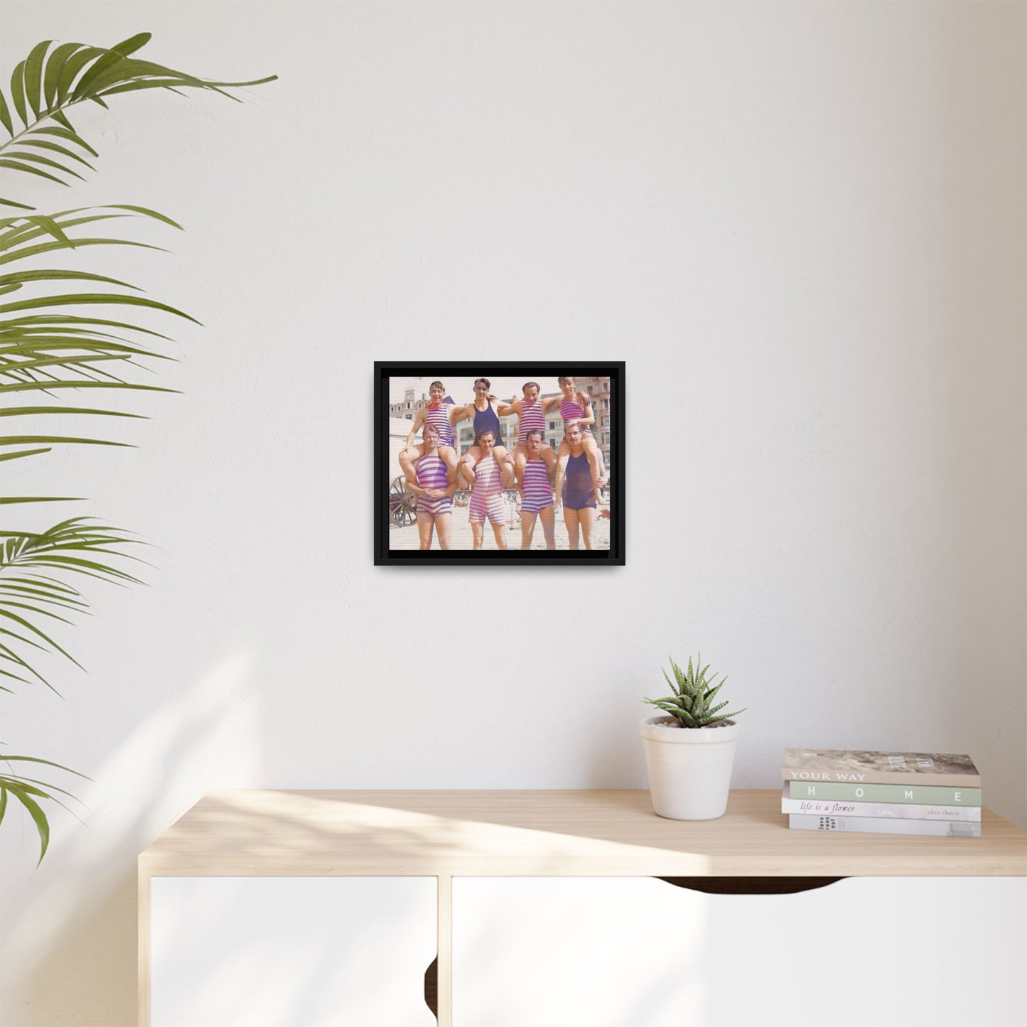 Restored vintage photo of a Bachelor Party in Corpus Christi TX, featuring men in striped swimwear forming human towers, framed canvas art.