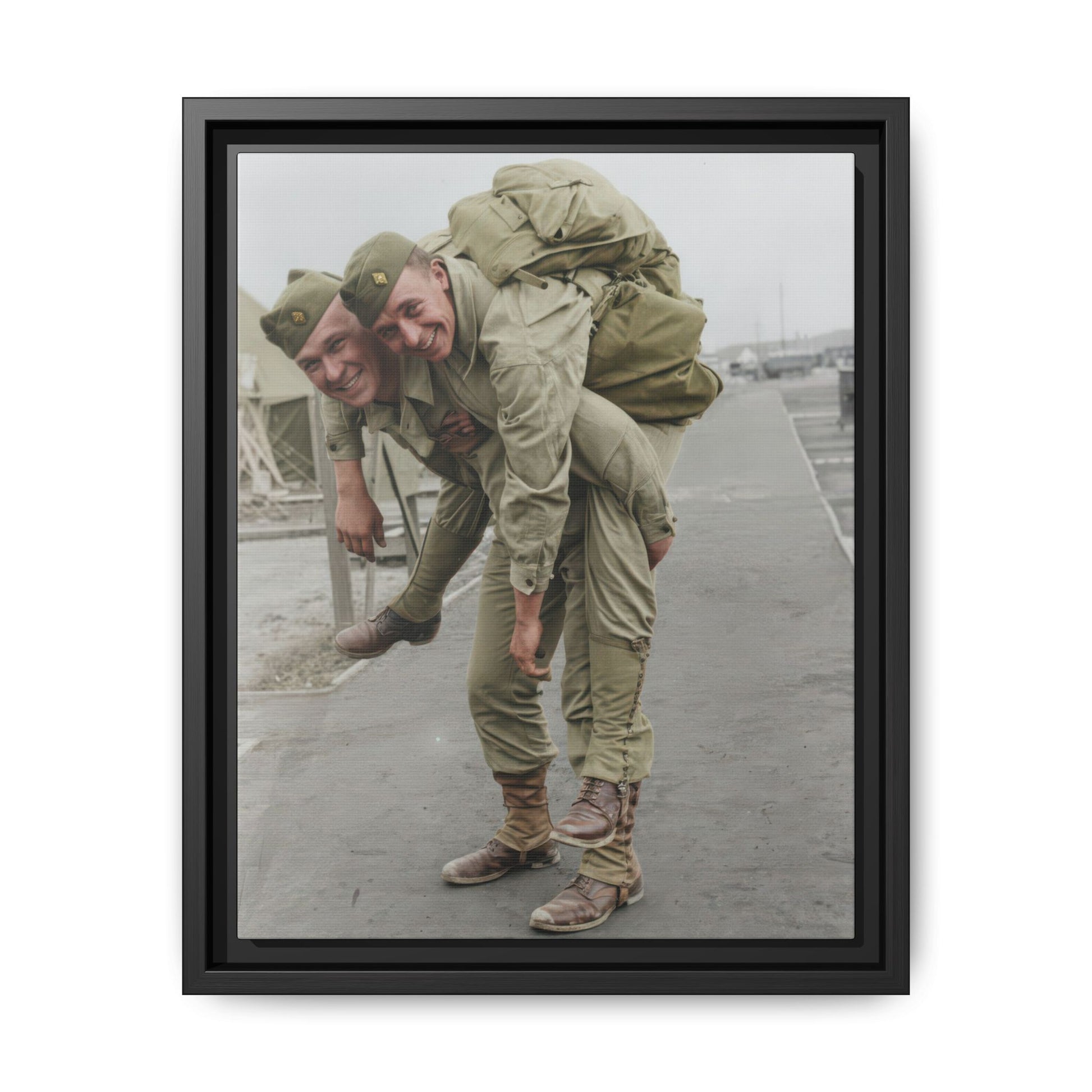 Two uniformed men outdoors in a piggyback pose in a vintage photograph reproduction