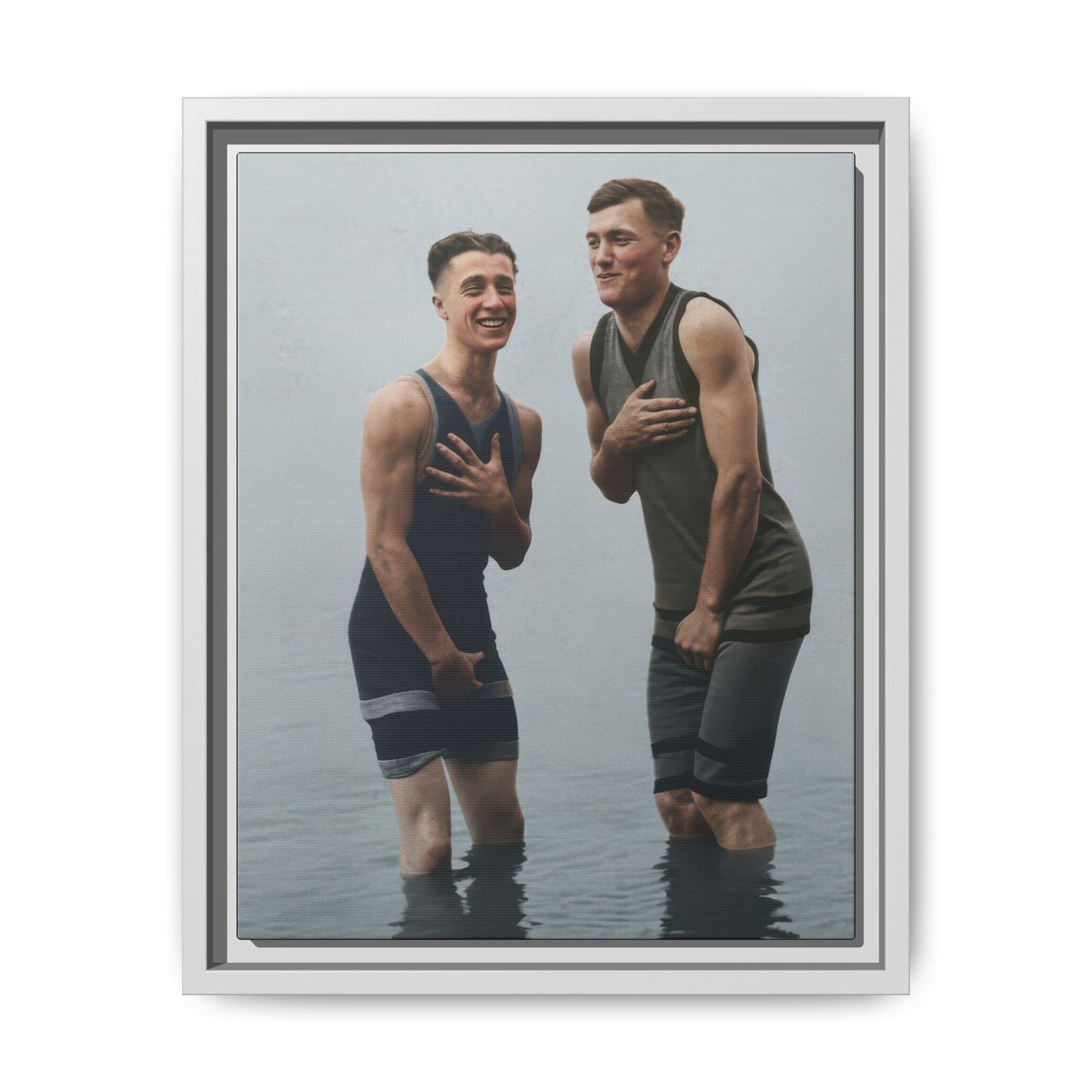 Historical waterside snapshot reproduced as archival canvas wall art with two men in one-piece swimwear 