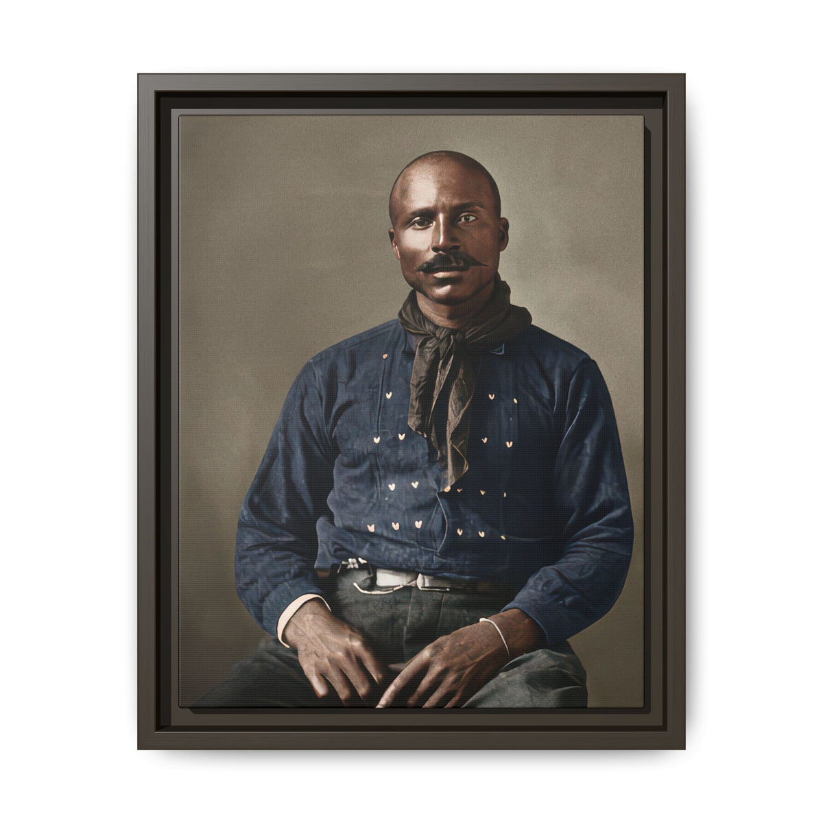 Black male sitter with a shaped mustache looking toward the camera, his hands resting across his lap and slender wrist jewelry visible.