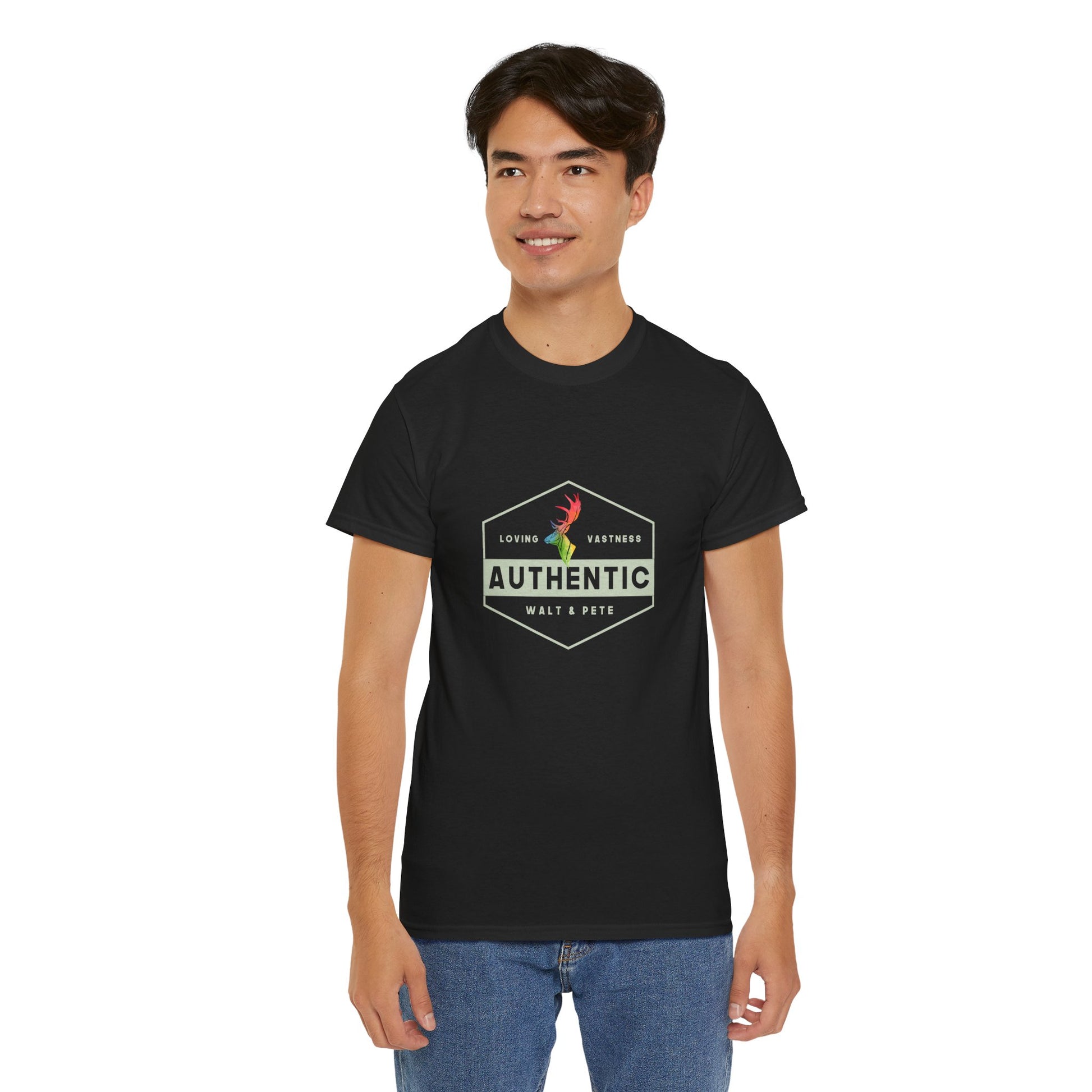 unisex LGBTQ+ t-shirt with a hexagonal badge design reading “Authentic” and “Loving & Vastness,” featuring a rainbow antler—symbolizing self-love, queer pride, and emotional depth.