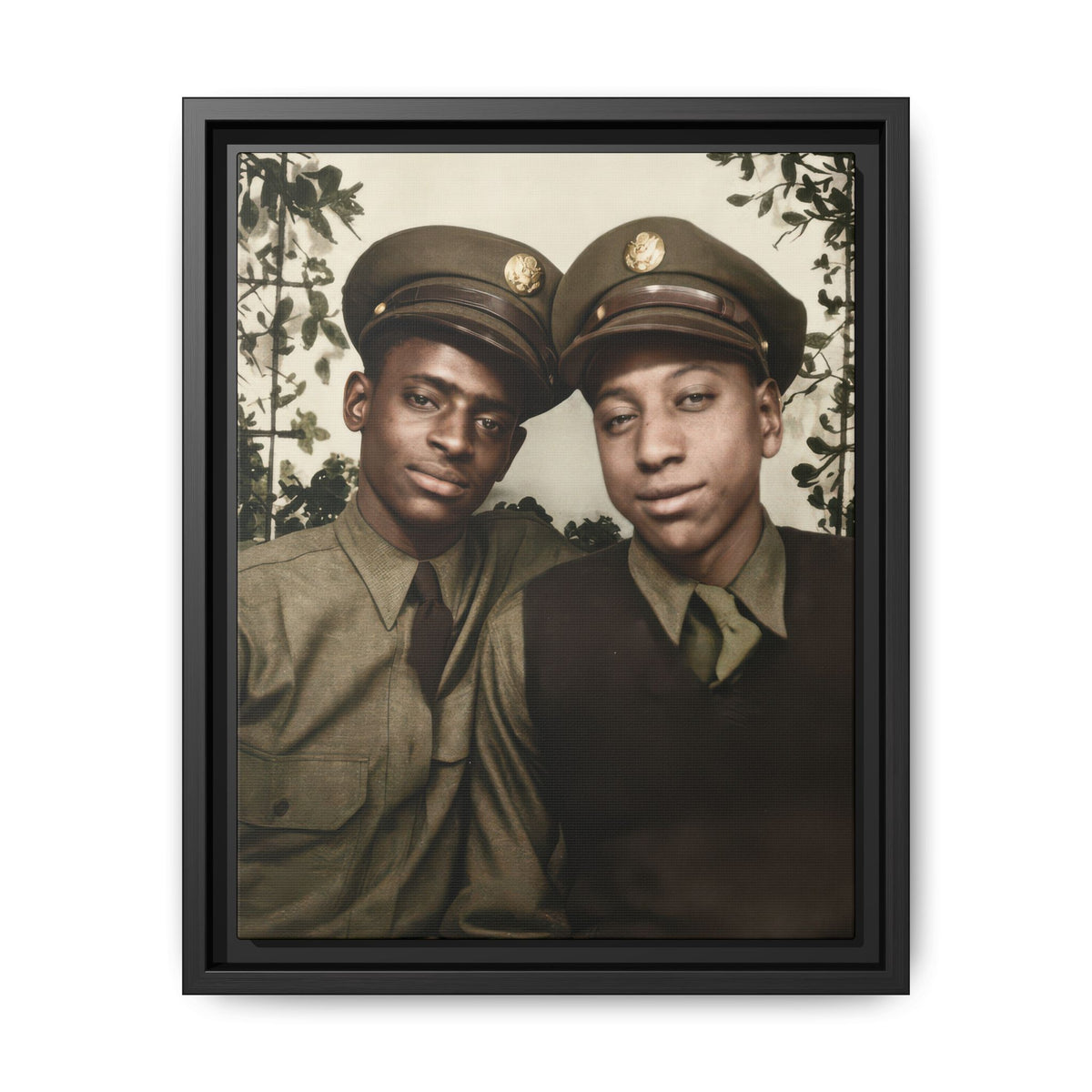 African American military portrait circa 1940–1950 showing two Black men in uniform against a decorative foliage backdrop.