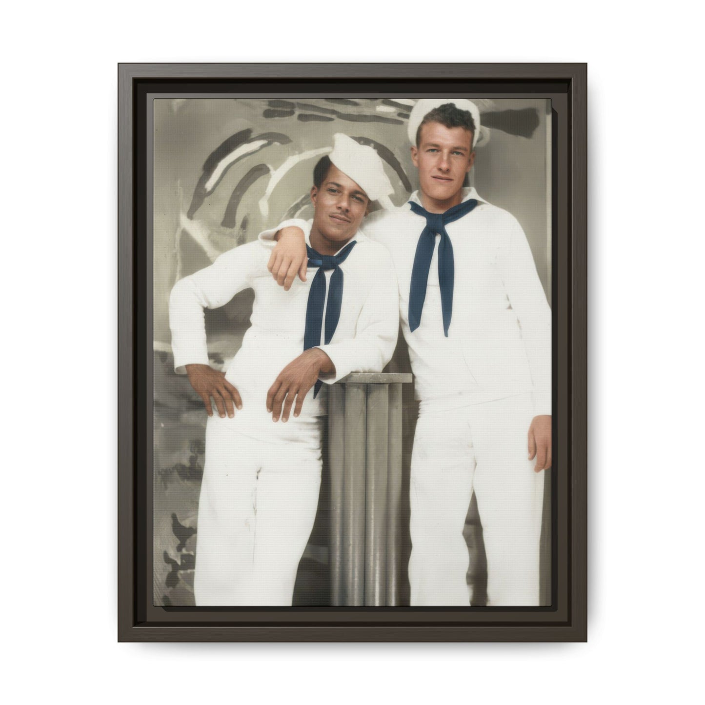 Early 20th century sailor portrait showing two uniformed men beside a studio pedestal