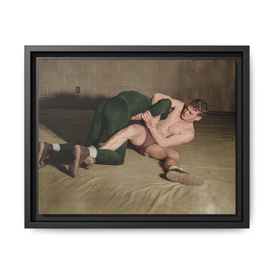 Vintage photograph of two wrestlers practicing a ground hold on a gymnasium mat circa 1945 to 1955 