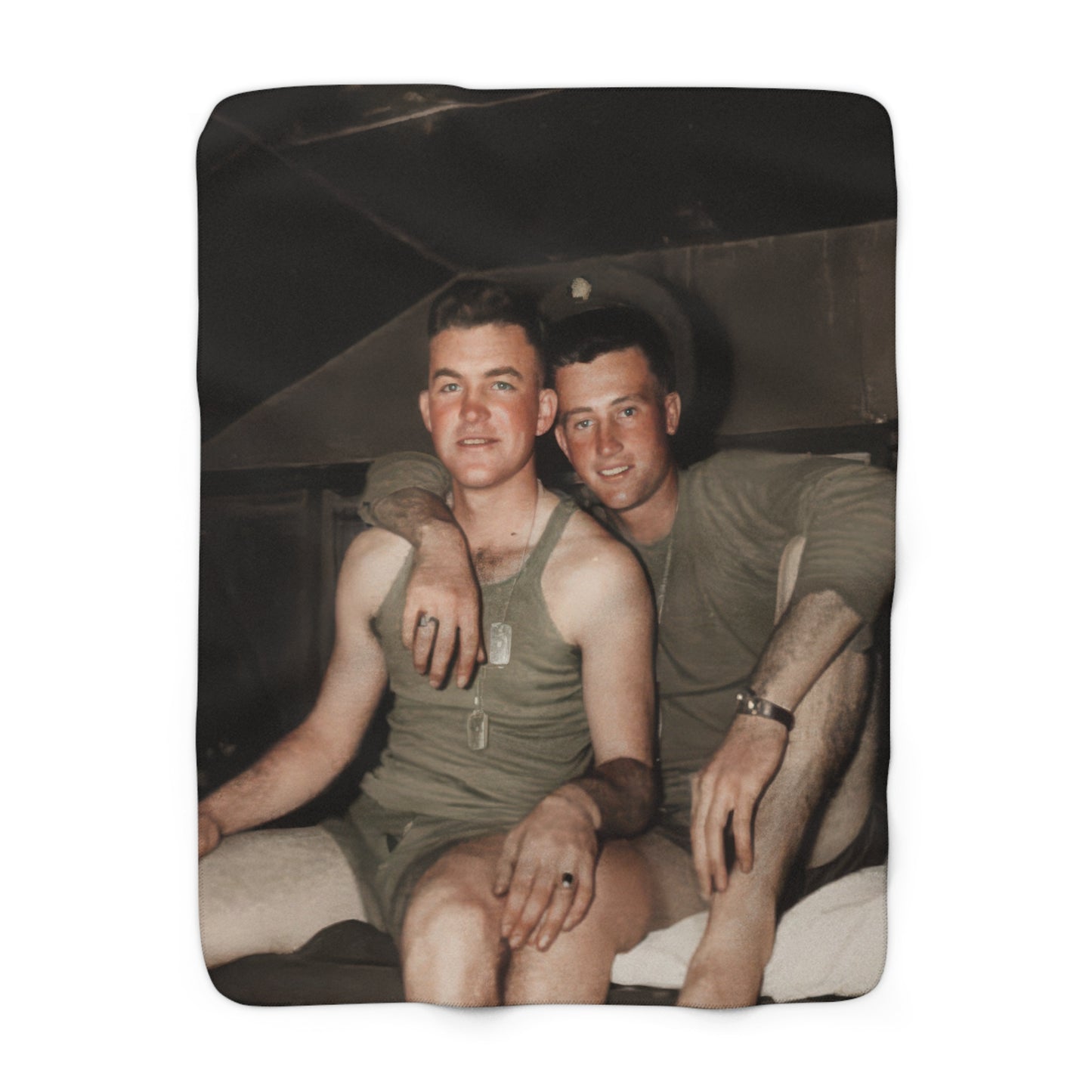 Heirloom sherpa blanket featuring two young servicemen seated together on a bunk 