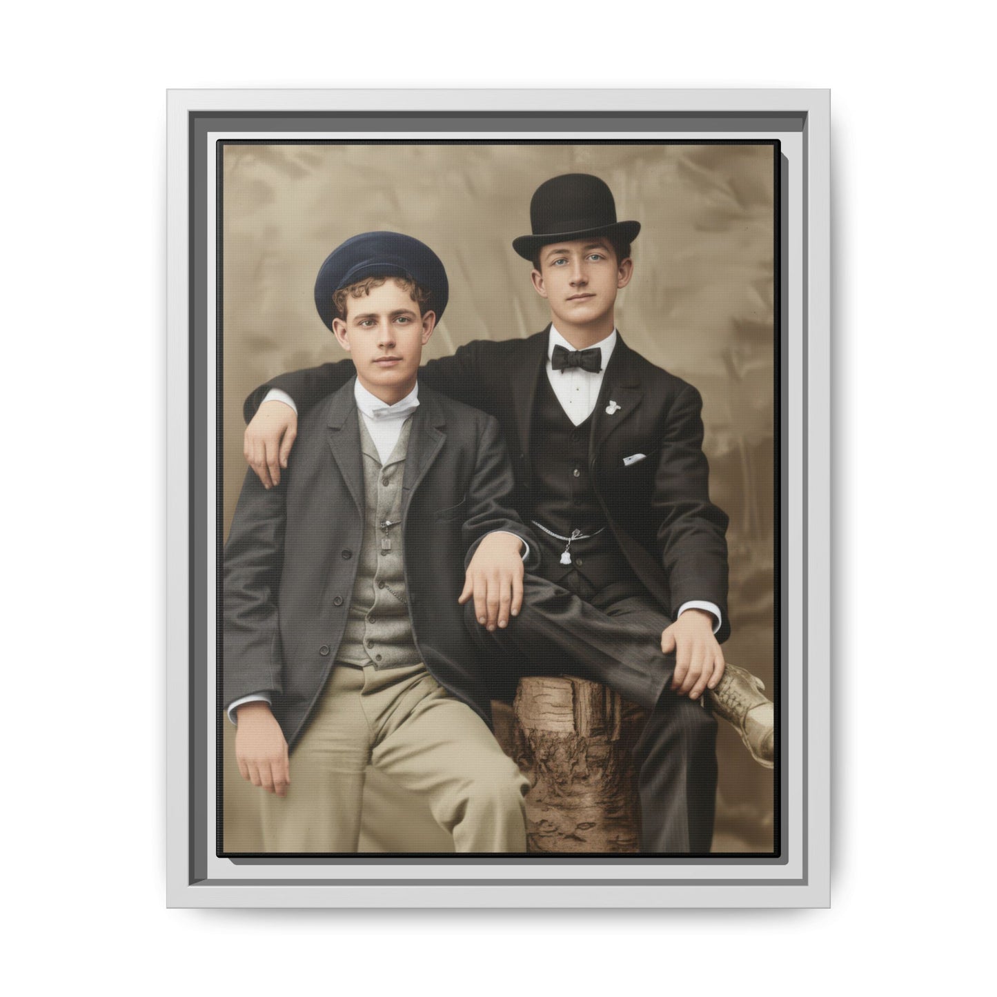 Historic studio portrait featuring two men in formal early 1900s clothing