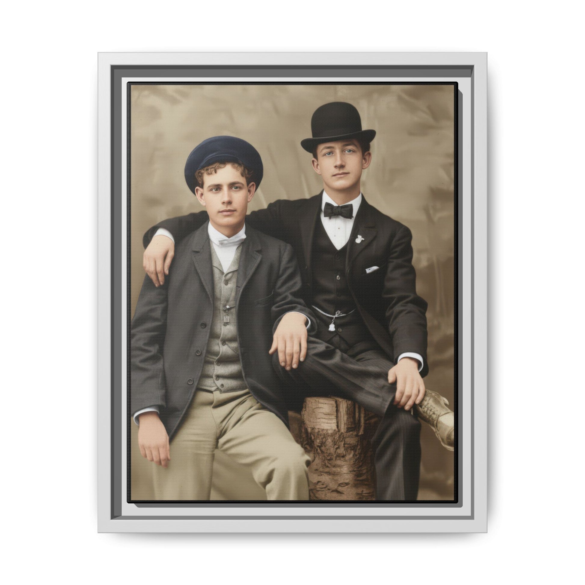 Historic studio portrait featuring two men in formal early 1900s clothing