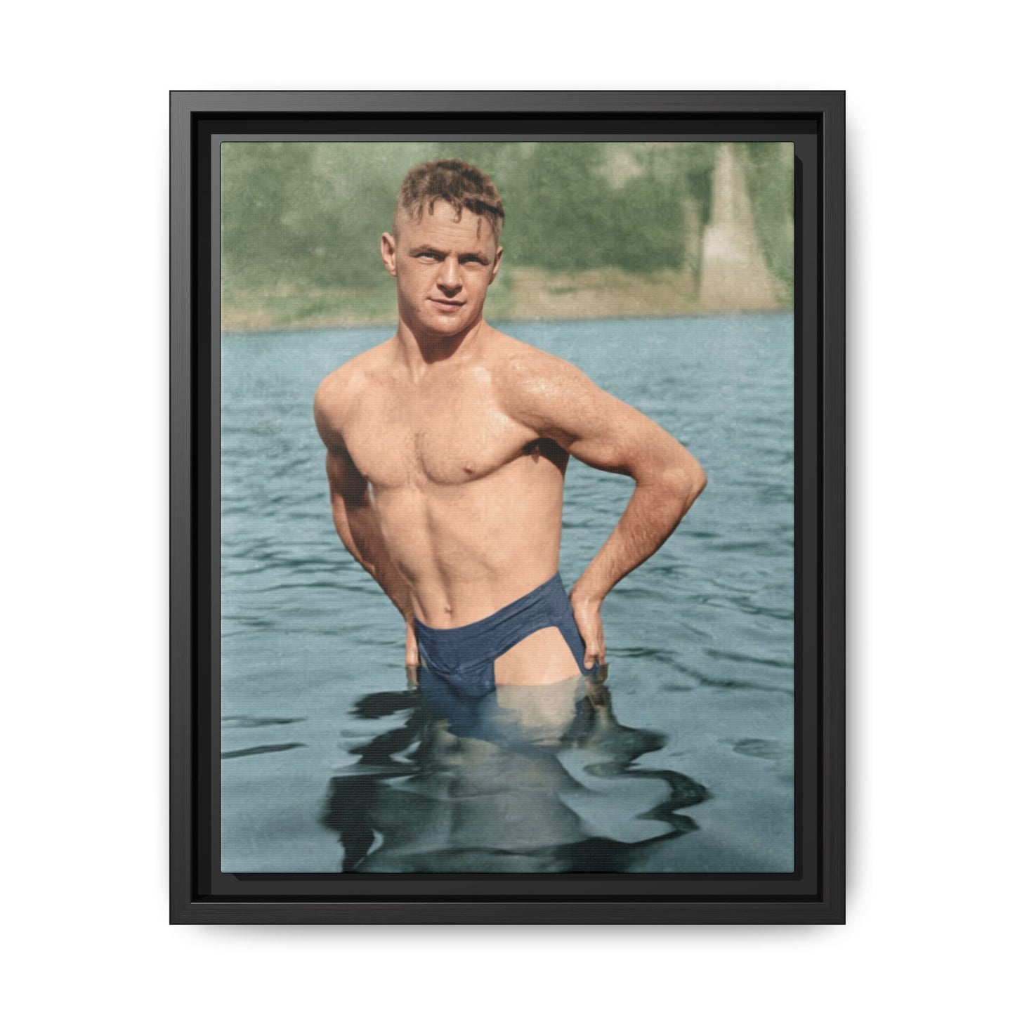 Framed vintage canvas wall art showing a single bather standing waist-deep in a lake 