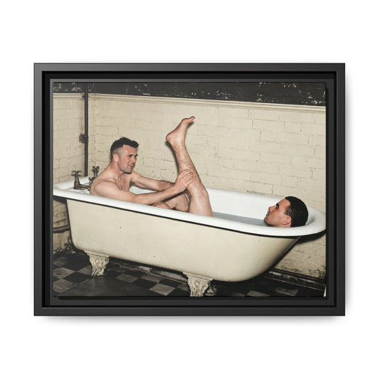 Paire 162 restored vintage photograph of two men sharing a white clawfoot bathtub, one holding the other's raised leg.