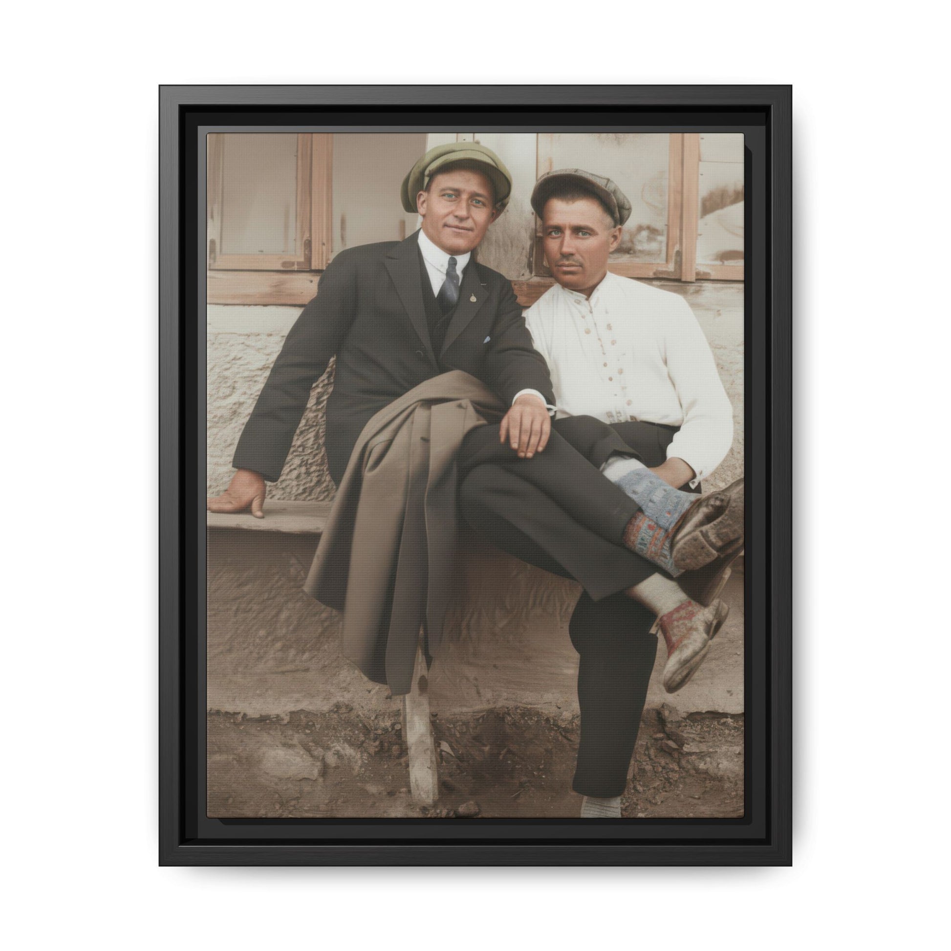 Vintage outdoor double portrait of two seated men in caps beside open windows and a plaster wall