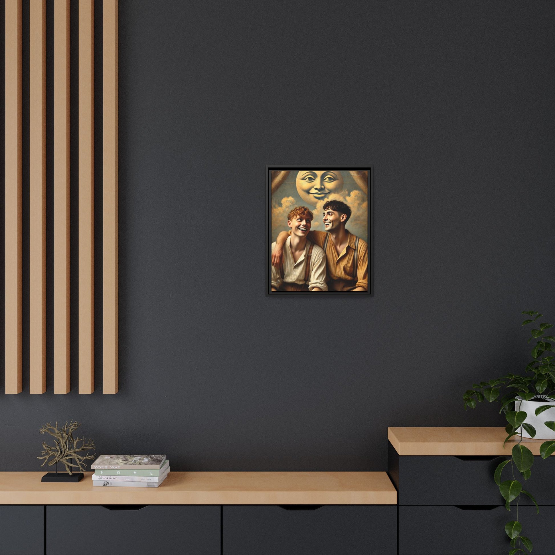 Queer artwork of two joyful young men dressed in vintage clothing with rolled sleeves and suspenders, laughing under a large moon prop in a dreamy studio scene. A celebration of love and resilience reclaimed from forgotten queer histories.